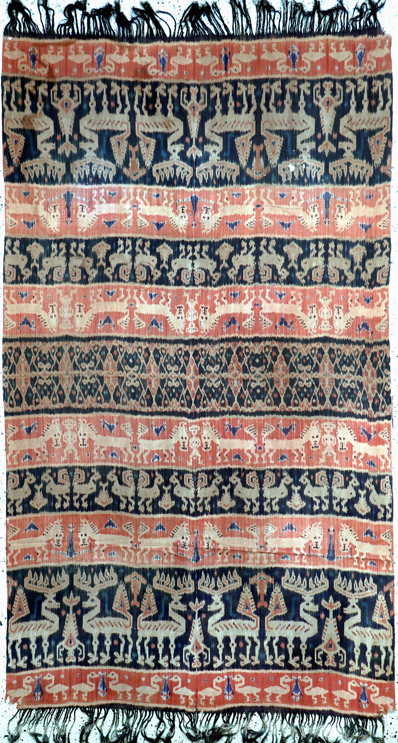 Sumba"Ikat", Indonesien, Anfang 20.Jhd, Baumwolle, ca. 235 x 135 cm, EHZ: 2, (Ecken beschädigt & kleine Löcher).