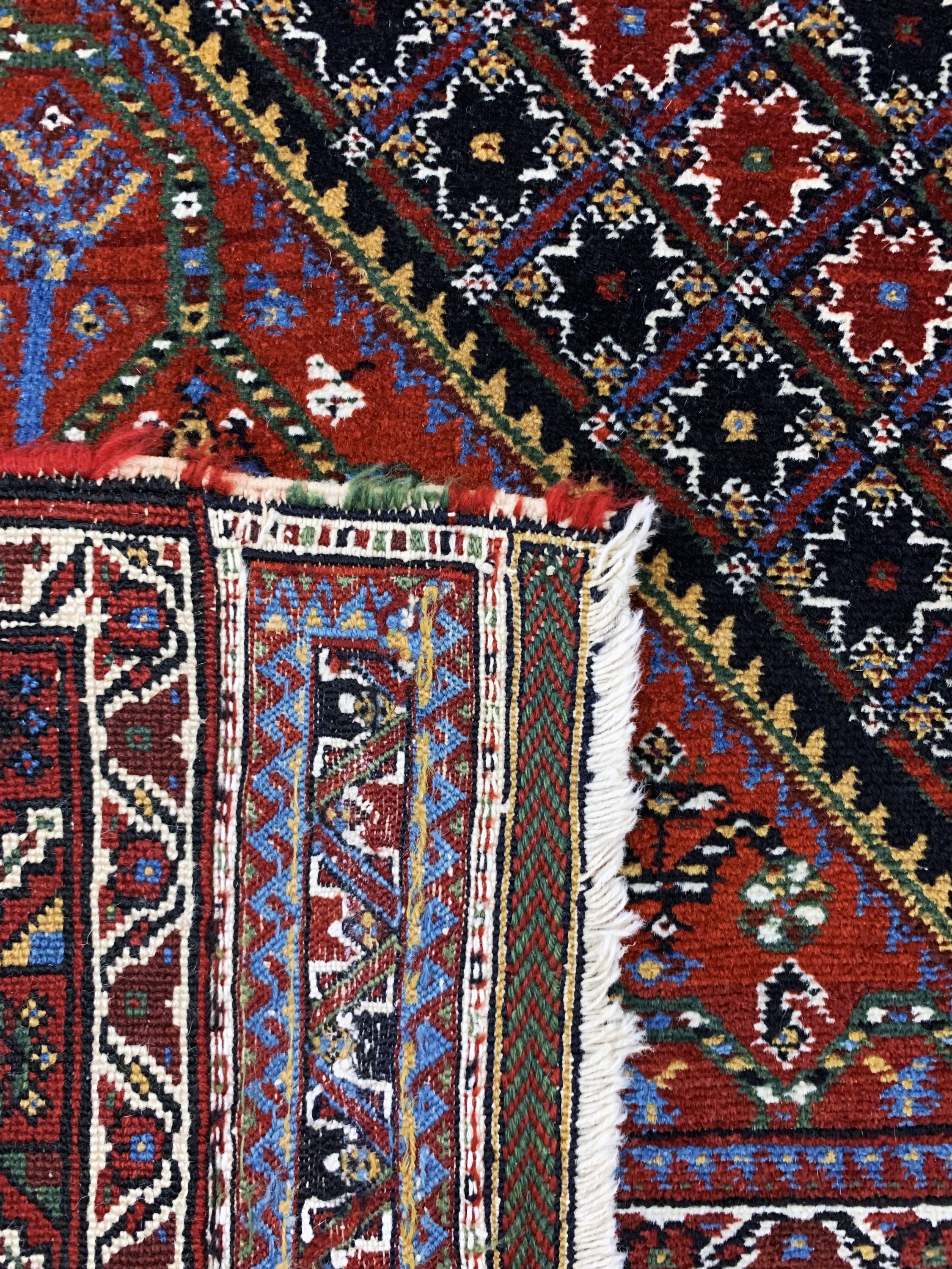 Detail f: Antiker Afschar, Persien, 19.Jhd, Wolle aufWolle, ca. 208 x 130 cm, EHZ: 2( flachgewebte Abschlüsse).