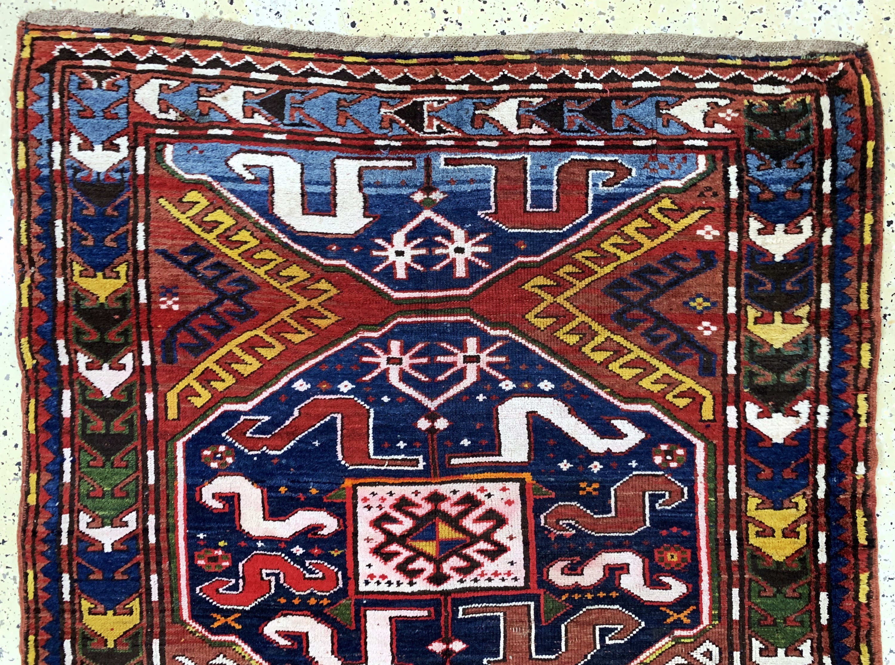 Detail a: "Wolkenband"Kazak, Kaukasus, Anfang 20.Jhd,Wolle auf Wolle, ca. 259 x 130 cm, verfärbt, EHZ: 2-3