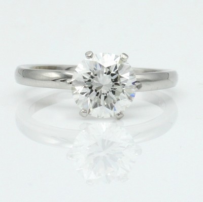 26994299a - Ring mit Brillantsolitär, WG 750/000, Brill.ca. 1.55 ct Weiß(H)/si2, RW ca. 54, Orig. ...