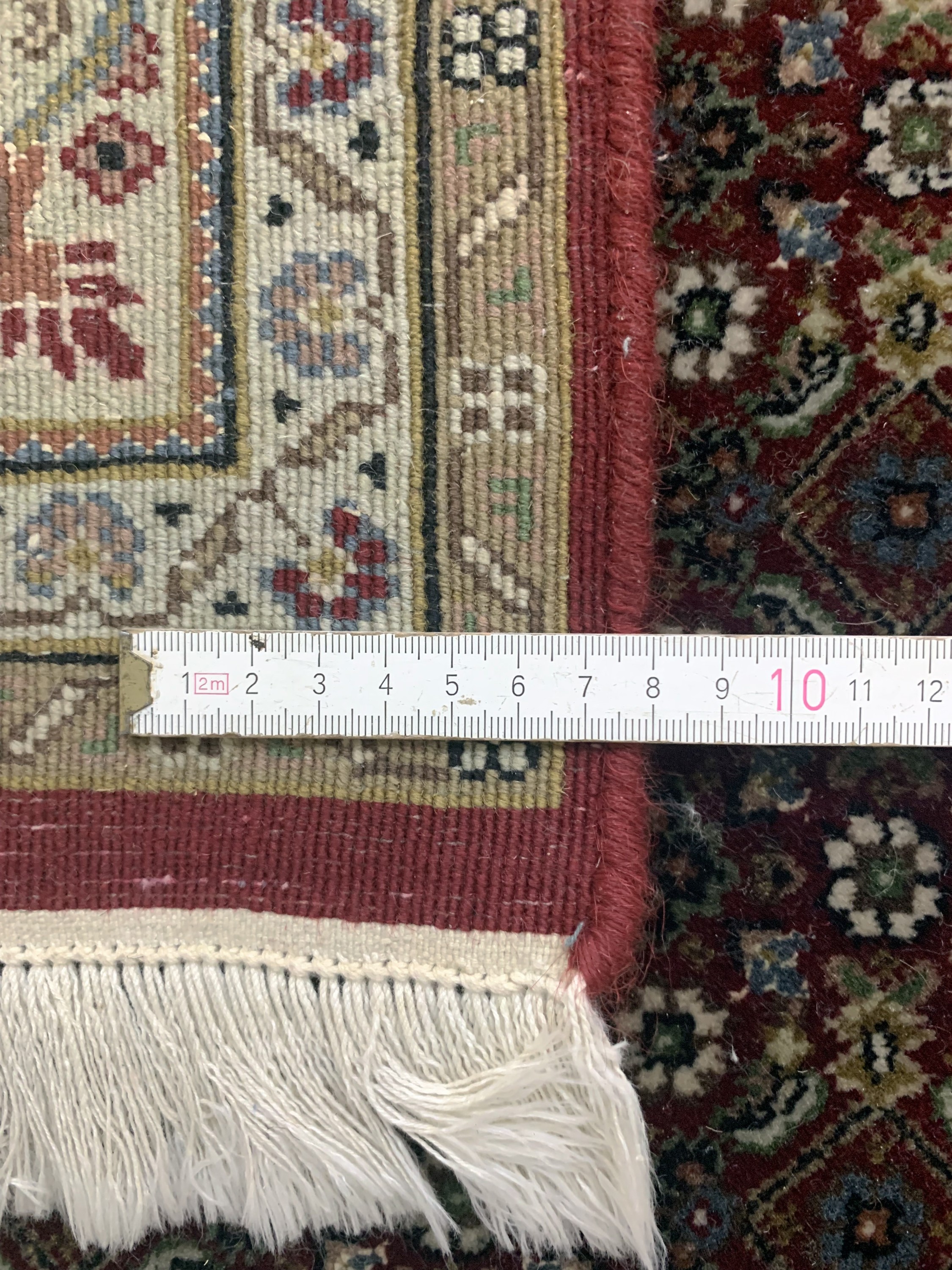 Detail e: Täbriz fein, Indien, Ende 20.Jhd, Korkwollemit Seide, ca. 200 x 145 cm, EHZ: 2