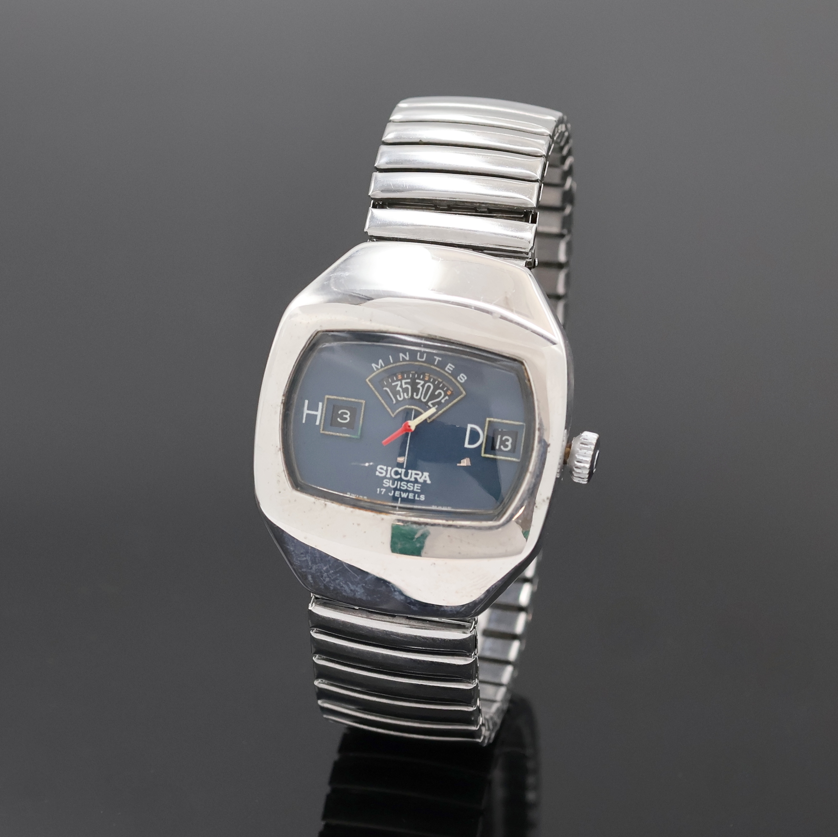 Image 26996163 - SICURA Herrenarmbanduhr mit springender Stunde, Schweiz um 1970, Handaufzug, verchr. ...