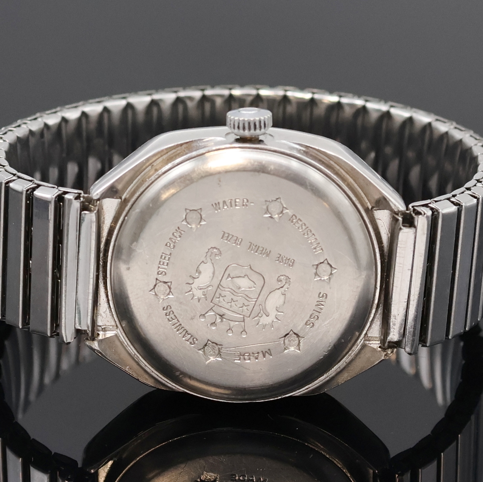 Detail c: SICURA Herrenarmbanduhr mit springender Stunde, Schweiz um 1970, Handaufzug, verchr. Geh., Stahlboden verschr., neutr. Flexband, blaues Zifferbl., ...