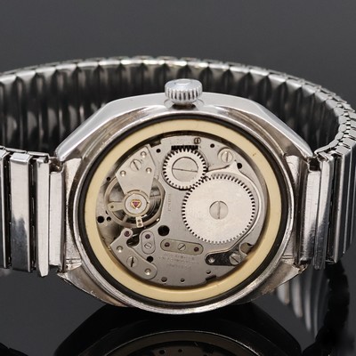 26996163d - SICURA Herrenarmbanduhr mit springender Stunde, Schweiz um 1970, Handaufzug, verchr. ...