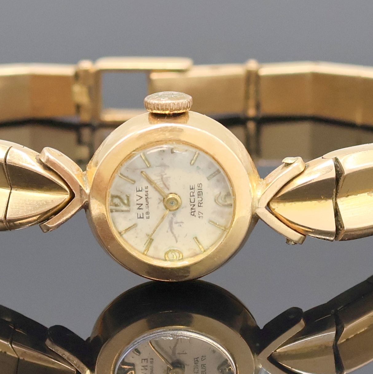 Detail a: ENVE Damenarmbanduhr in RG 750/000, Handaufzug, Schweiz um 1960, 2-teil. Geh. inkl. Gliederband im Verlauf, Boden aufgedr., silb. Zifferbl. m. ...