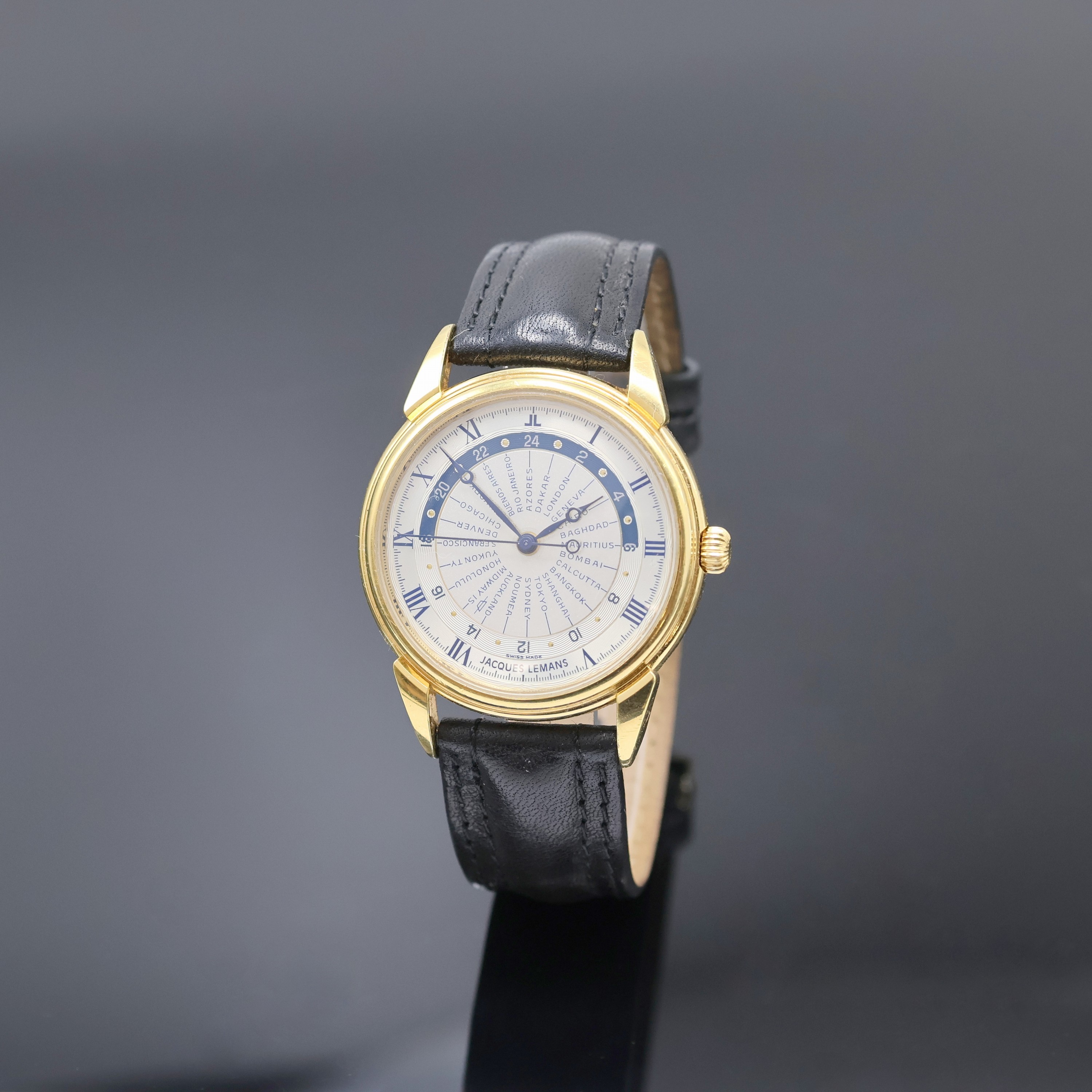 Image 26996952 - JAQUES LEMANS Herrenarmbanduhr Worldtimer Referenz 607, Schweiz um 1995, Automatik, ...
