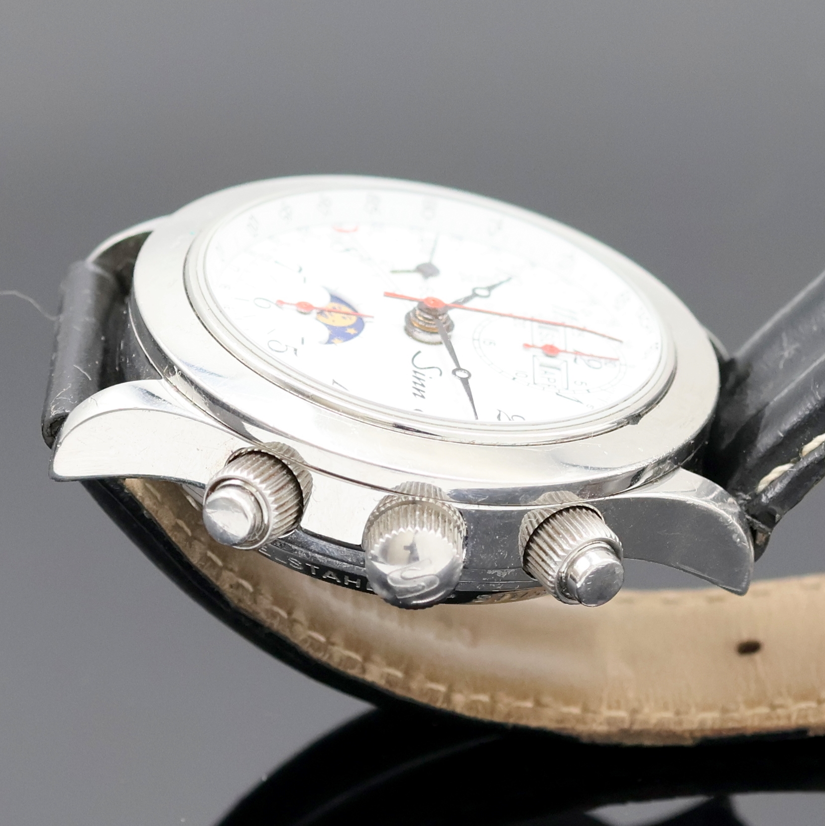 Detail b: SINN Armbandchronograph mit Vollkalender Referenz 6026, Deutschland um 1995, Automatik, Edelstahlgeh. beids. vergl., Boden u. Krone verschr., ...