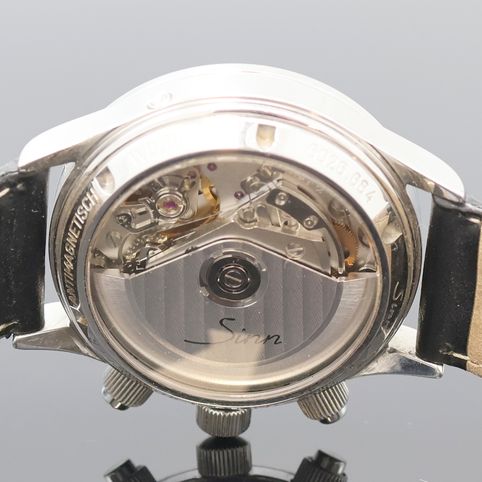 Detail d: SINN Armbandchronograph mit Vollkalender Referenz 6026, Deutschland um 1995, Automatik, Edelstahlgeh. beids. vergl., Boden u. Krone verschr., ...