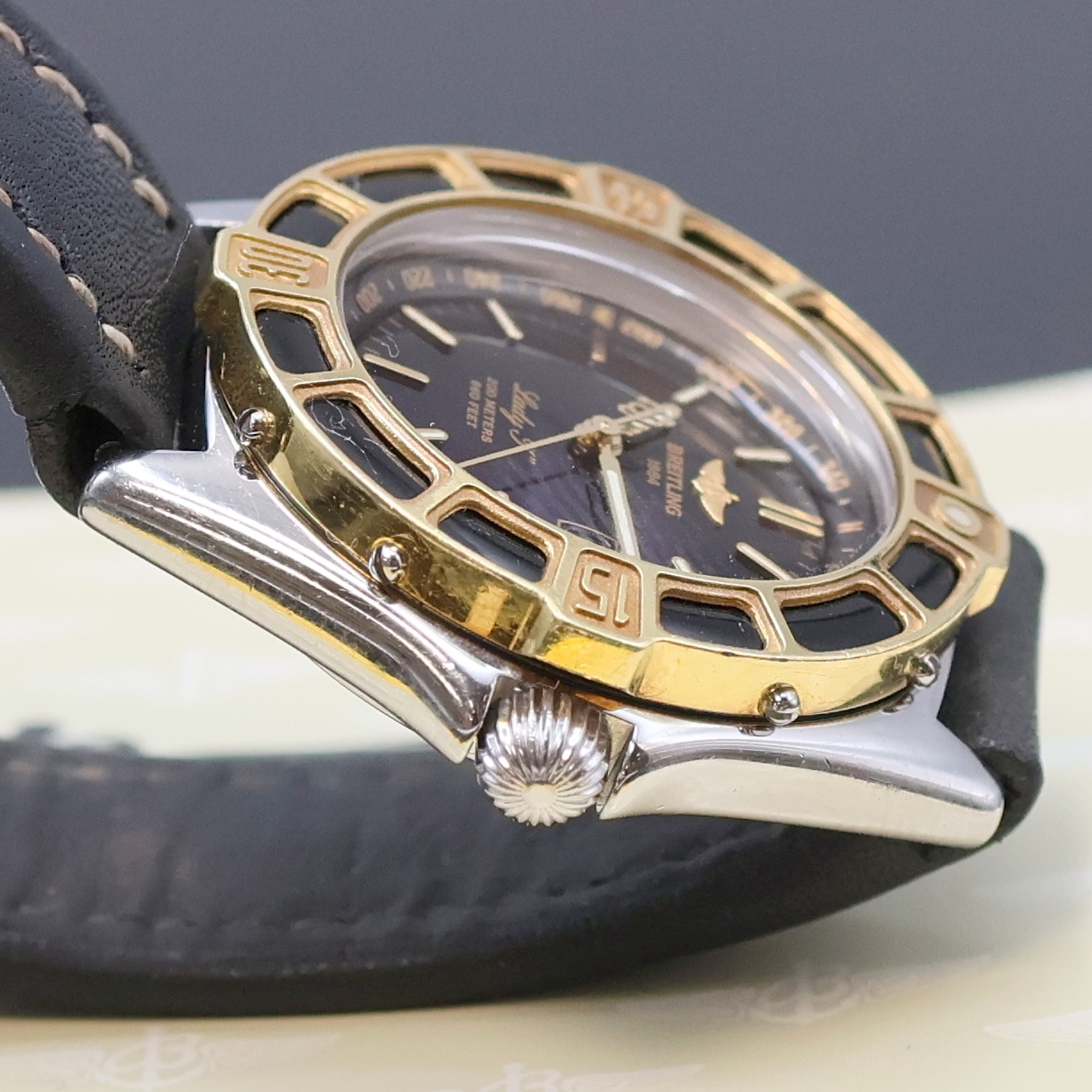 Detail c: BREITLING Lady J Damenarmbanduhr Referenz D52065, quarz, verschr. Edelstahlgeh., eins. rast. drehb. Gold-Lünette, Lederband m. orig. Faltschl., ...
