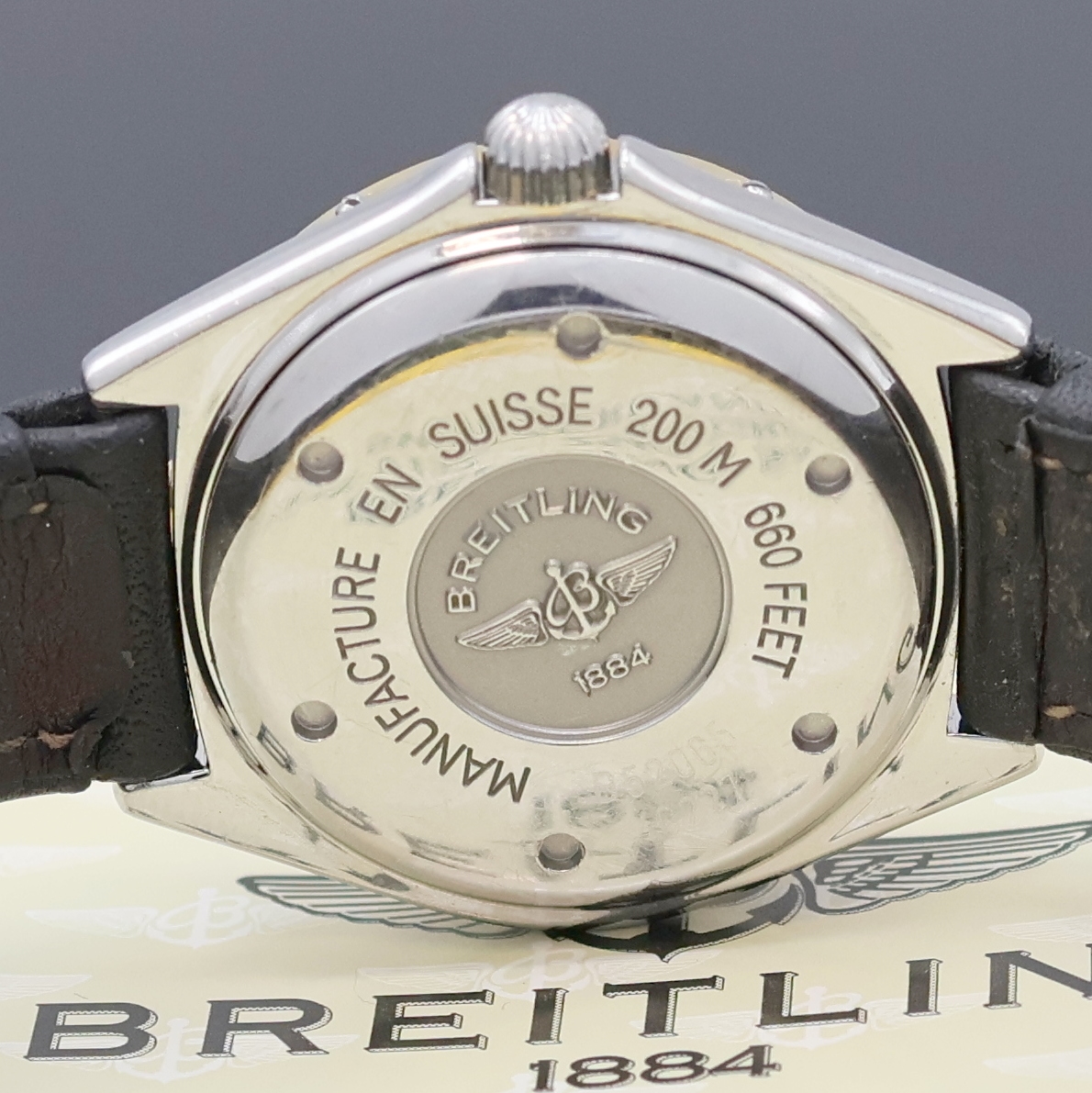 Detail d: BREITLING Lady J Damenarmbanduhr Referenz D52065, quarz, verschr. Edelstahlgeh., eins. rast. drehb. Gold-Lünette, Lederband m. orig. Faltschl., ...