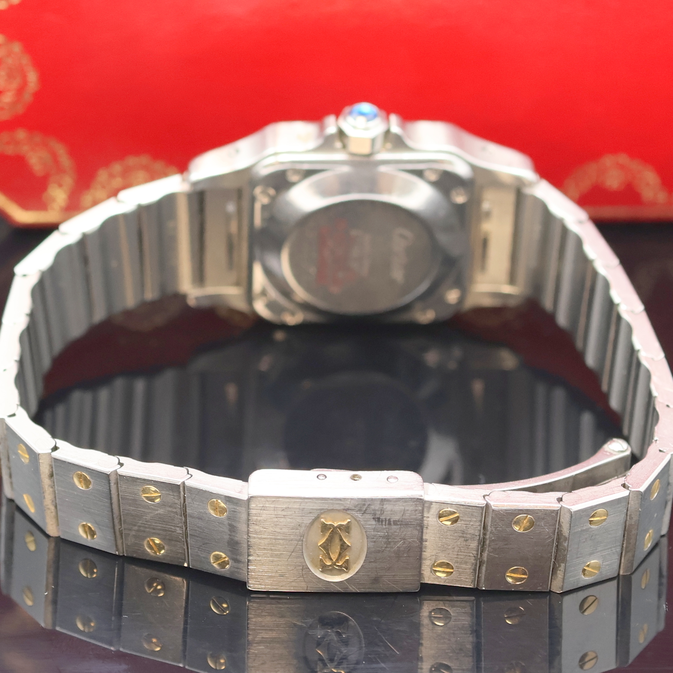 Detail b: CARTIER Santos Damenarmbanduhr, Schweiz um 1990, Automatik, Edelstahlgeh. inkl. orig. Gliederband m. Faltschl., Schmuckkrone, Boden 8-fach verschr., ...