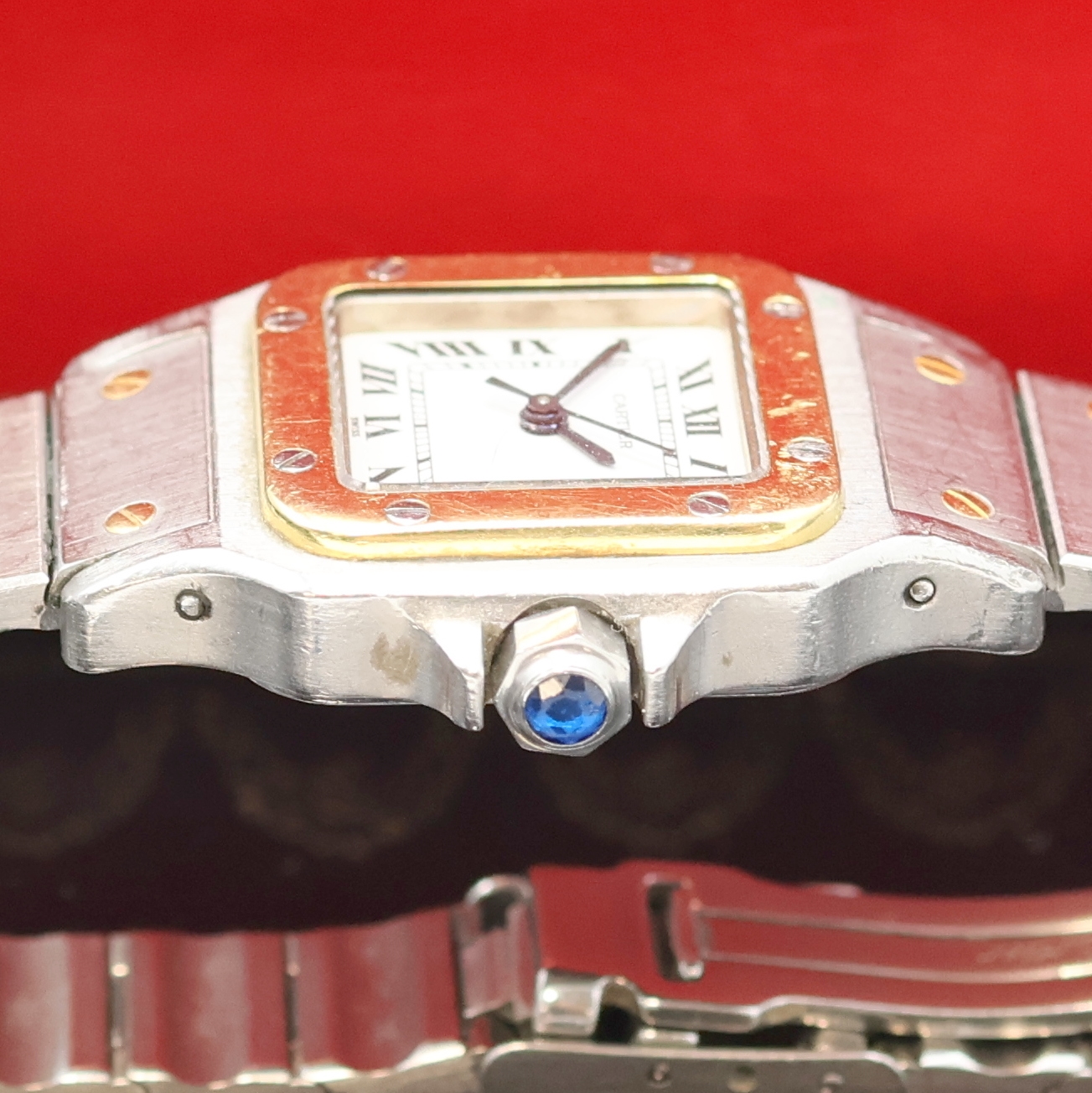 Detail c: CARTIER Santos Damenarmbanduhr, Schweiz um 1990, Automatik, Edelstahlgeh. inkl. orig. Gliederband m. Faltschl., Schmuckkrone, Boden 8-fach verschr., ...