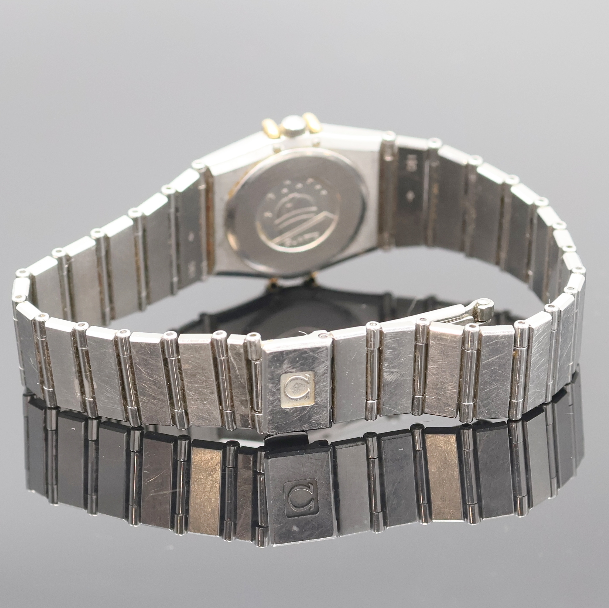 Detail c: OMEGA Constellation Damenarmbanduhr Referenz 795.1076, Schweiz um 1990, quarz, Edelstahl/Gold inkl. orig. Gliederband m. Faltschl., Boden aufgedr., ...
