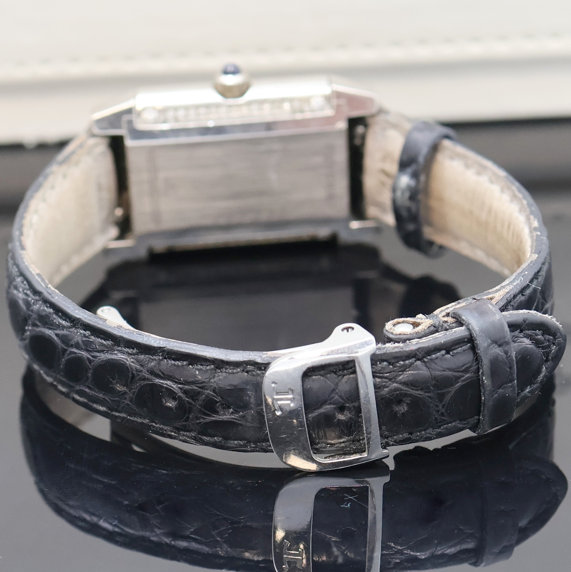 Detail e: Jaeger-LeCoultre Reverso Damenarmbanduhr Referenz 265.3.86 in WG 750/000 mit Diamanten, Schweiz um 2000, Handaufzug, um 180 Grad drehb. Wendegeh. mit ...
