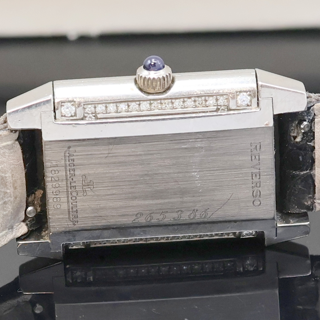 Detail g: Jaeger-LeCoultre Reverso Damenarmbanduhr Referenz 265.3.86 in WG 750/000 mit Diamanten, Schweiz um 2000, Handaufzug, um 180 Grad drehb. Wendegeh. mit ...
