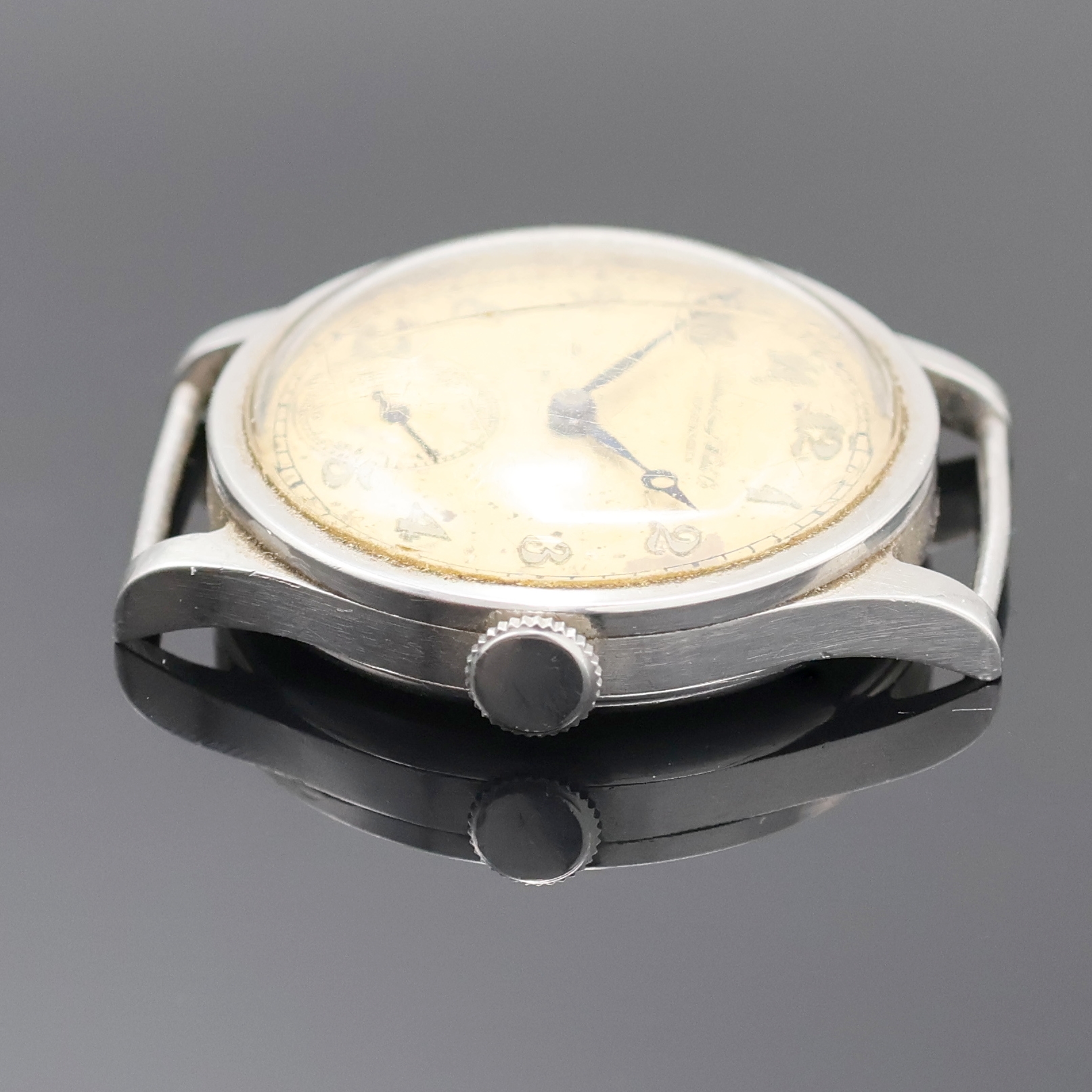 Detail a: IWC Armbanduhr in Stahl mit Kaliber 83 in seltener Ausführung, Schweiz um 1936, Handaufzug, 3 tlg.-Geh., Boden u. Glasrand aufgedr., silb. Zifferbl. ...