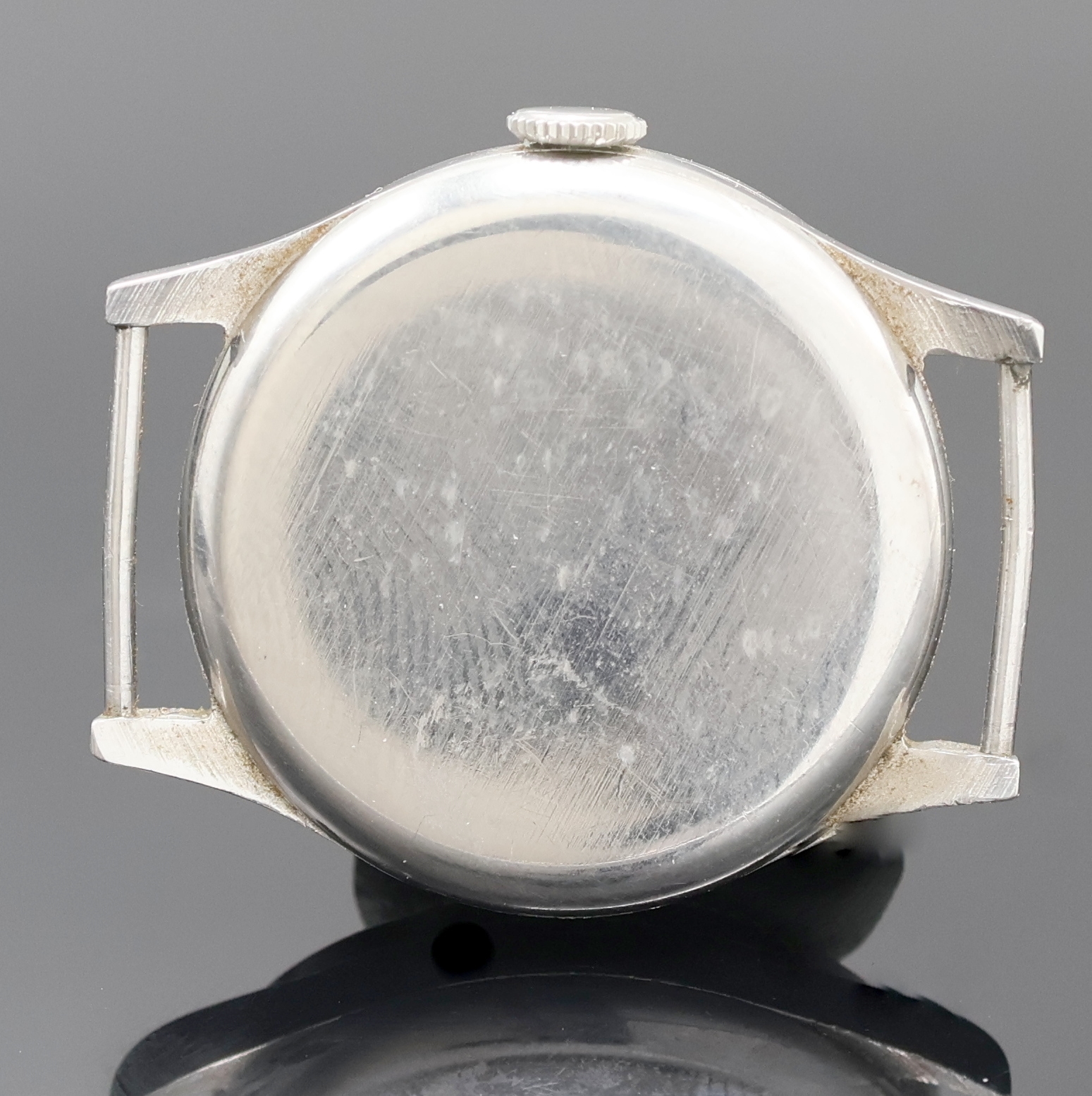 Detail b: IWC Armbanduhr in Stahl mit Kaliber 83 in seltener Ausführung, Schweiz um 1936, Handaufzug, 3 tlg.-Geh., Boden u. Glasrand aufgedr., silb. Zifferbl. ...