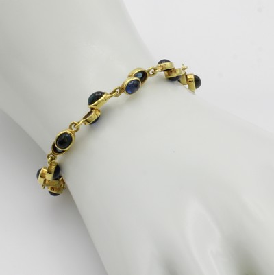 27000441a - Armband mit Saphiren, GG 585/000, ovale Saphircabochons versetzt gef. zus. ca. 13 ct, L. ...