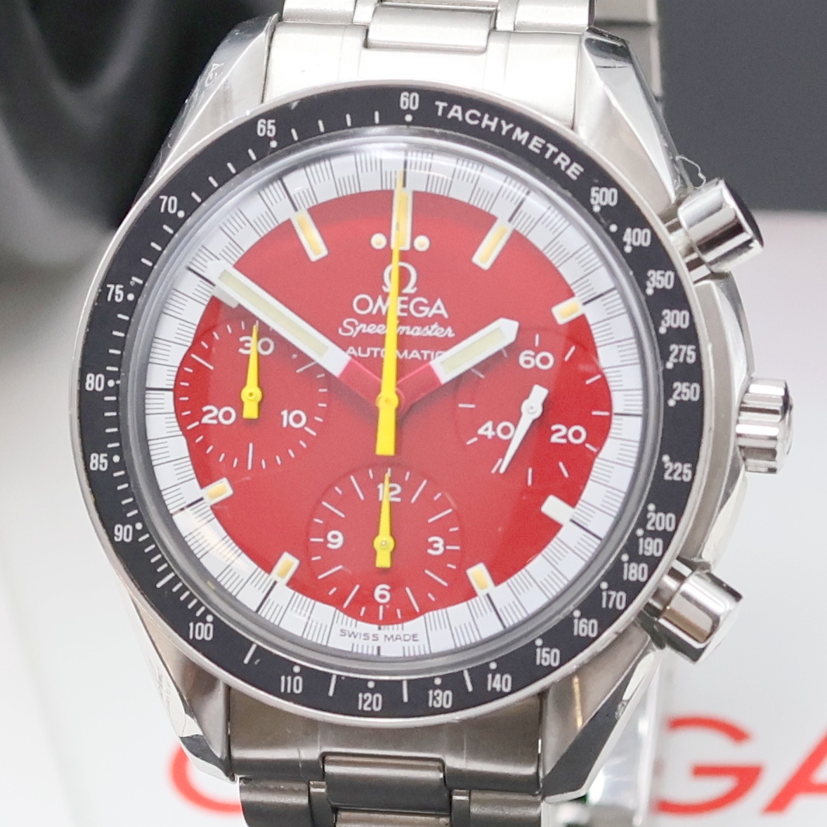 Detail a: OMEGA Herrenarmbanduhr Serie Speedmaster Sonderedition Michael Schumacher Referenz 3810.61, Automatik, Edelstahlgeh. inkl. orig. Gliederband m. ...