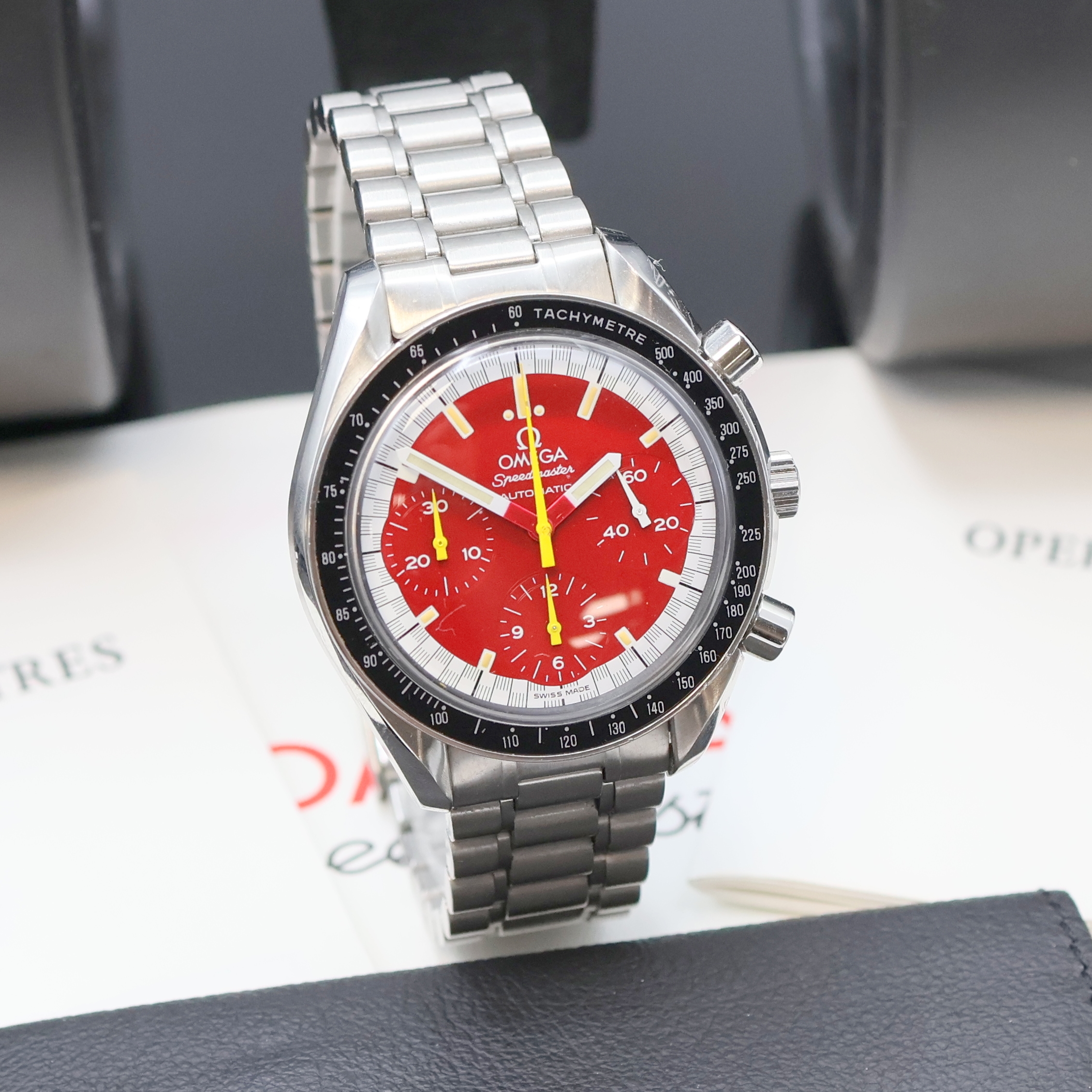 Detail b: OMEGA Herrenarmbanduhr Serie Speedmaster Sonderedition Michael Schumacher Referenz 3810.61, Automatik, Edelstahlgeh. inkl. orig. Gliederband m. ...