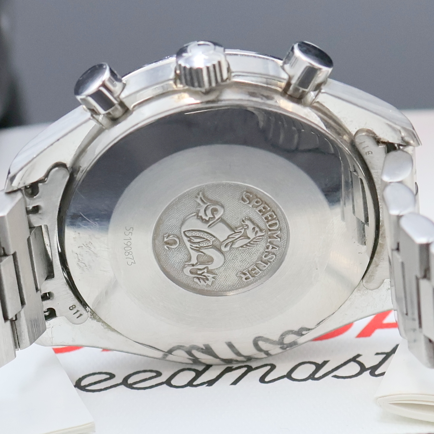 Detail e: OMEGA Herrenarmbanduhr Serie Speedmaster Sonderedition Michael Schumacher Referenz 3810.61, Automatik, Edelstahlgeh. inkl. orig. Gliederband m. ...