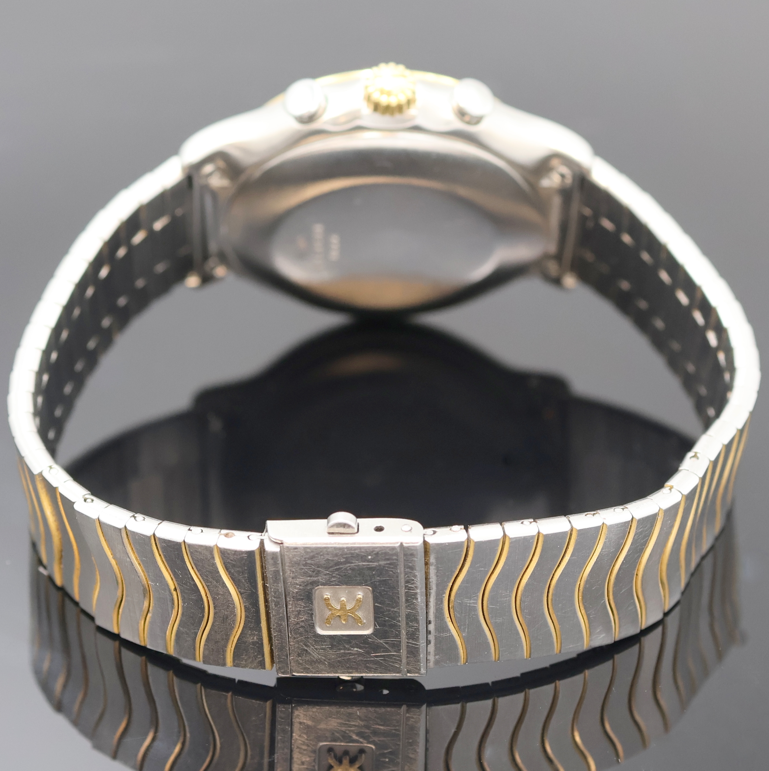 Detail c: EBEL Schaltradchronograph Referenz 1134901, Schweiz um 1990, Automatik, Edelstahl/Gold kombiniert inkl. Wellengliederband m. Kastenschl., Boden ...