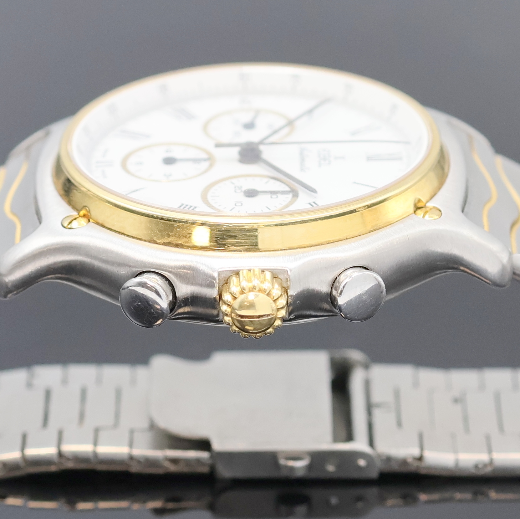Detail d: EBEL Schaltradchronograph Referenz 1134901, Schweiz um 1990, Automatik, Edelstahl/Gold kombiniert inkl. Wellengliederband m. Kastenschl., Boden ...