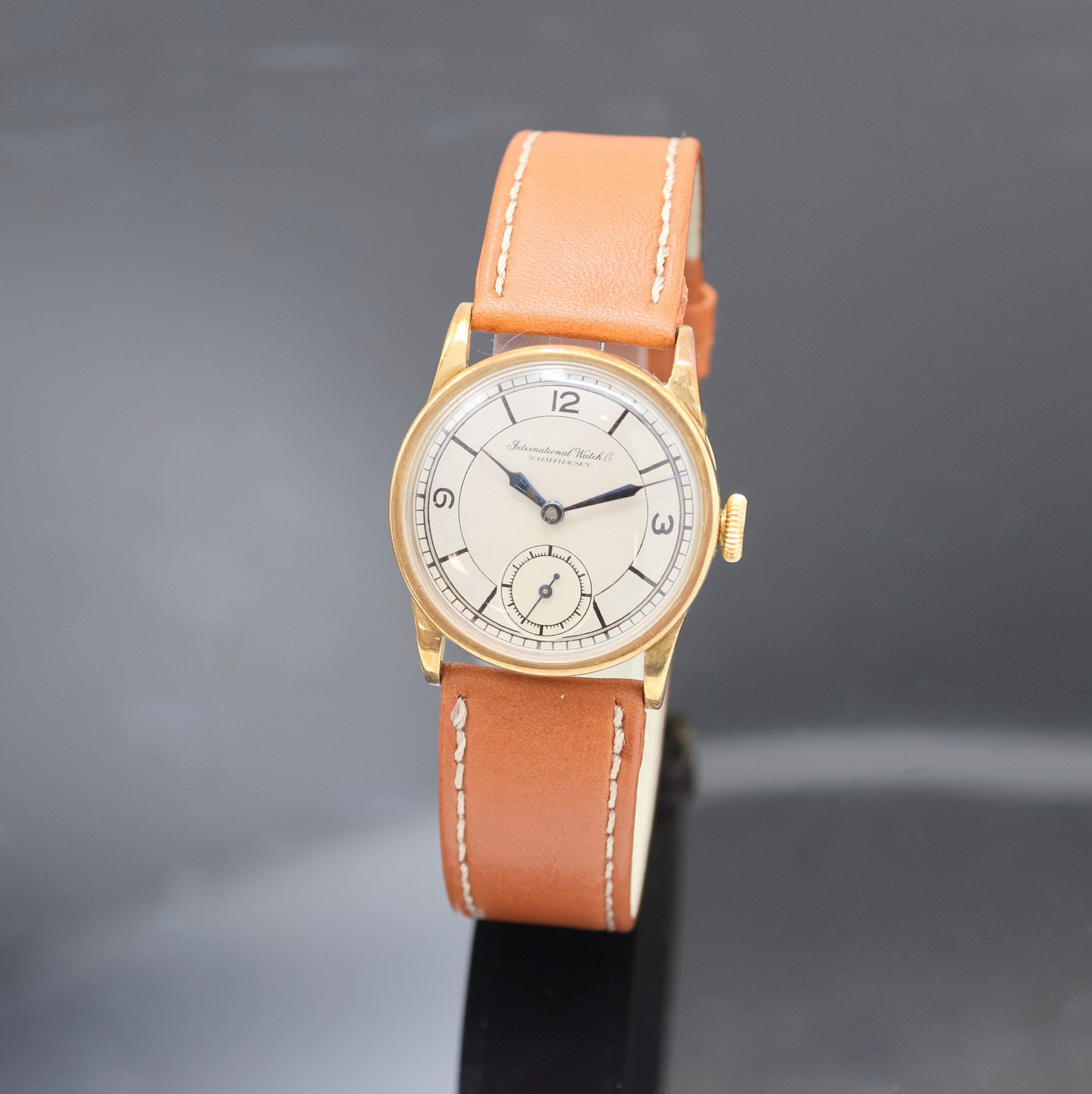 Image 27001047 - IWC Herrenarmbanduhr in GG 585/000, Schweiz um 1934, Handaufzug, Boden u. Glasrand ...