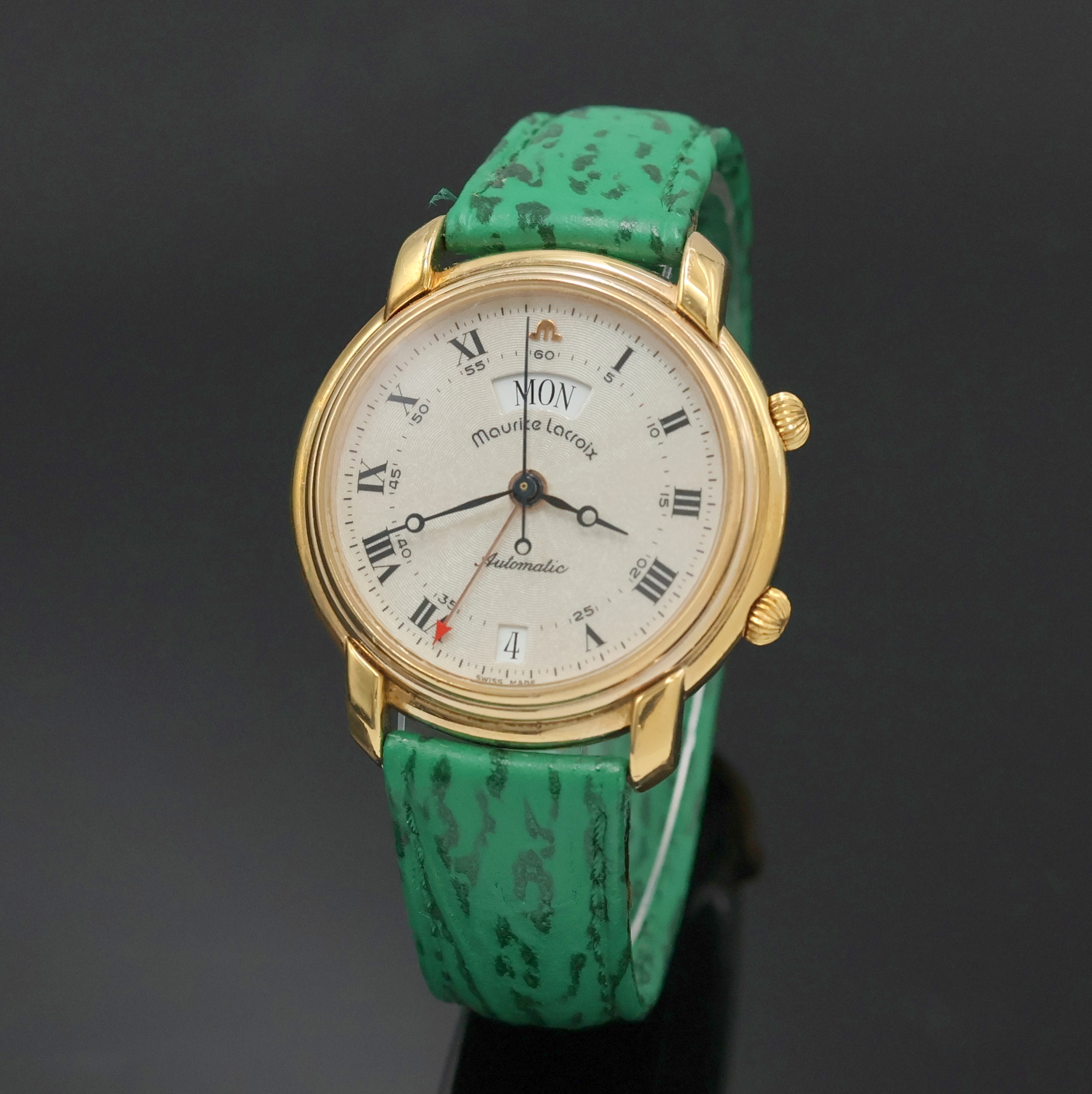 Detail a: MAURICE LACROIX Herrenarmbanduhr mit Wecker, Schweiz um 1995, Automatik, verg. Geh. beids. vergl., neutr. Lederband m. orig. verg. Dornschl., silb. ...