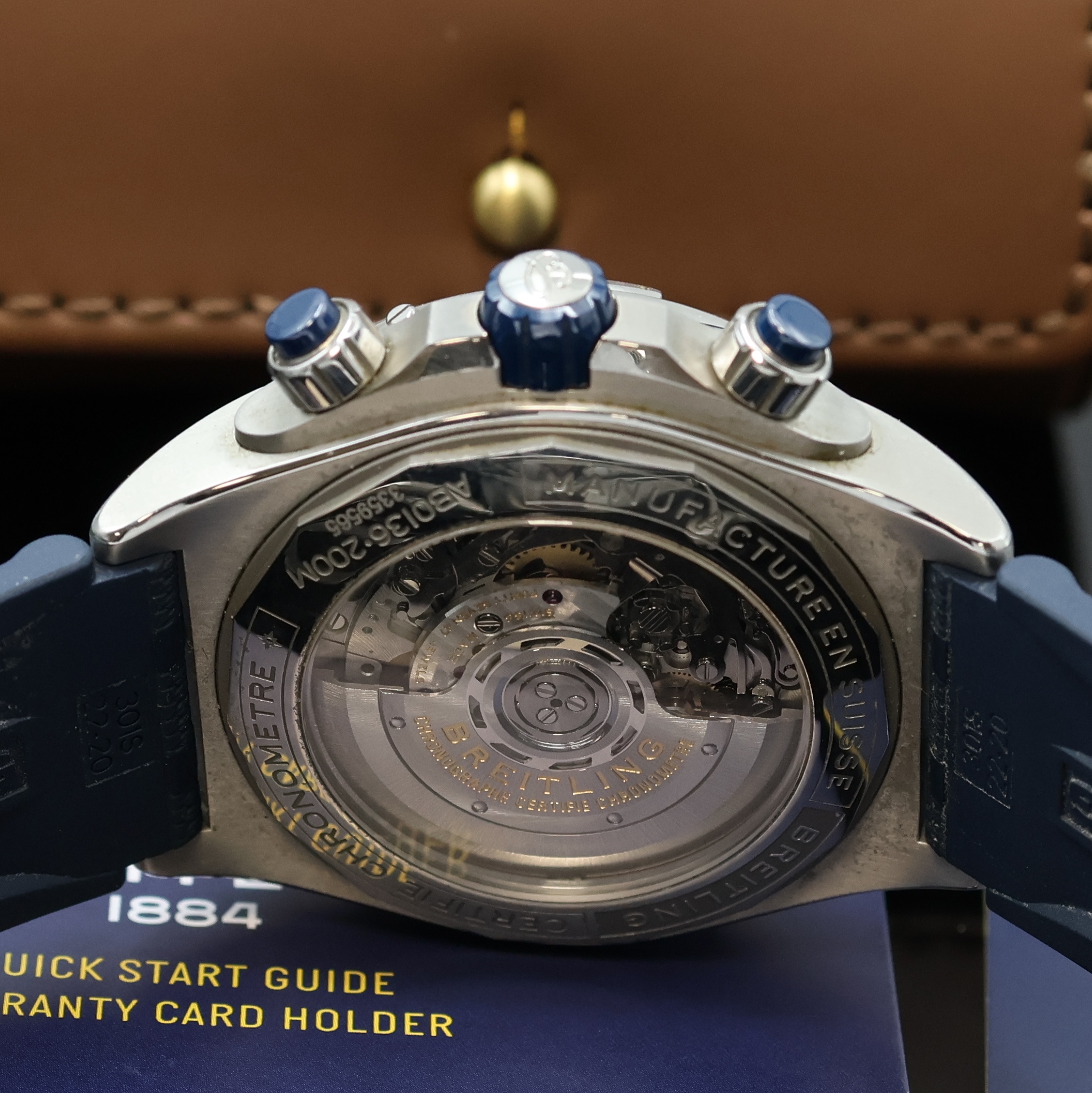 Detail d: BREITLING Super Chronomat B01 Chronometer Armbandchronograph Referenz AB0136, Schweiz um 2020, Automatik, Edelstahlgeh. beids. vergl., Boden, Krone ...