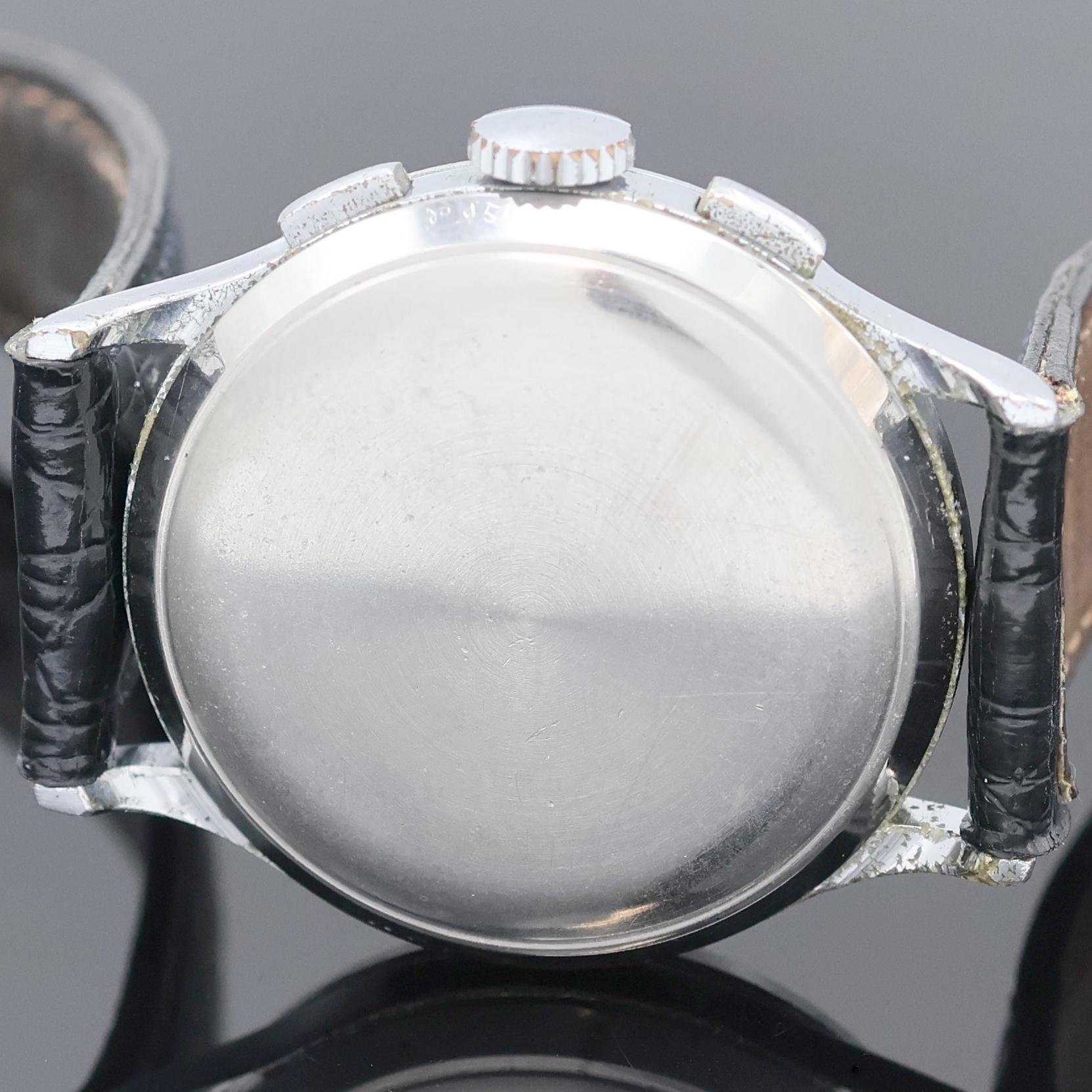 Detail e: JUNGHANS Schaltradchronograph mit Kaliber 88, Deutschland um 1950, Handaufzug, verchr. Geh., Stahlboden aufgedr., silb. Zifferbl. pat., arab. ...