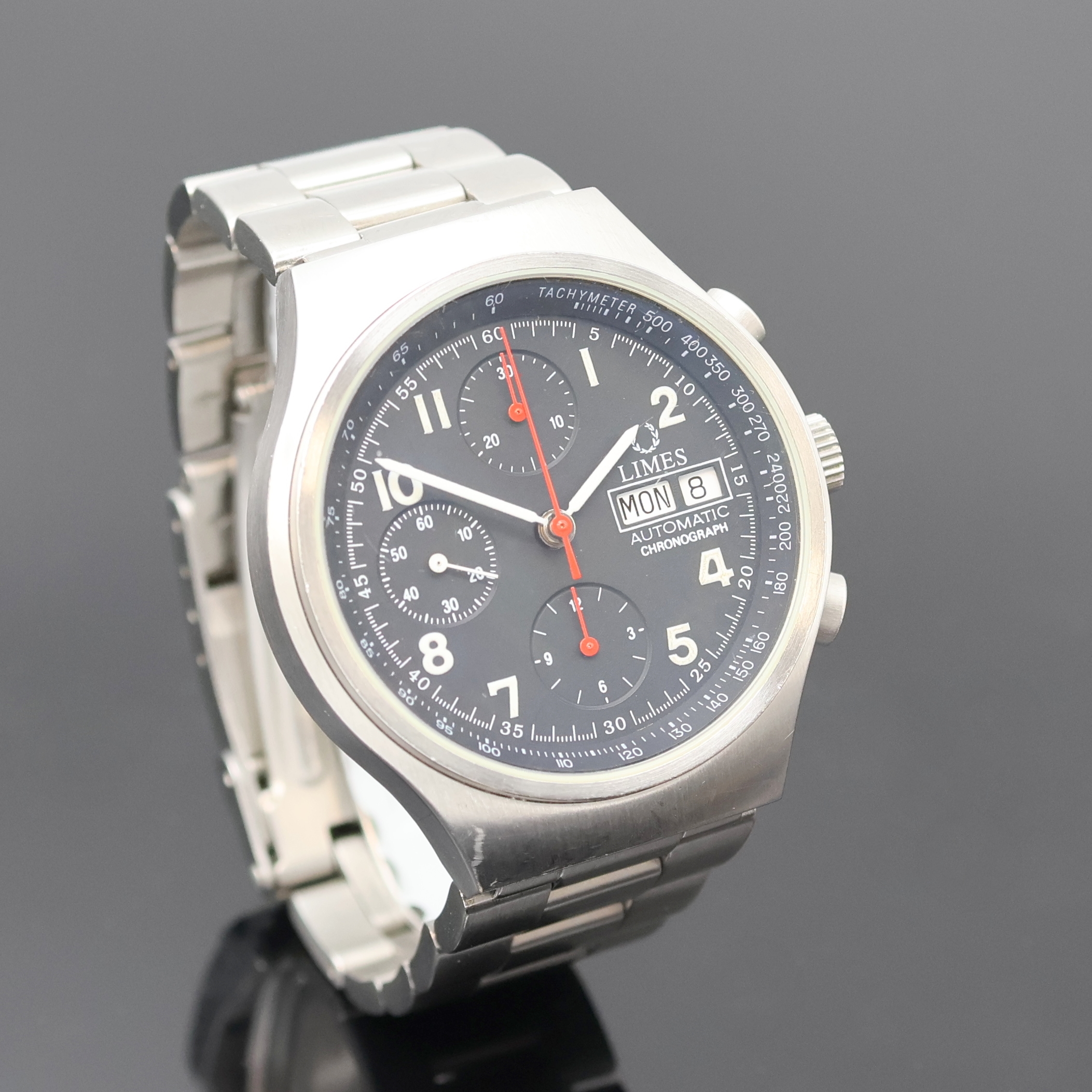 Detail b: LIMES Armbandchronograph in Stahl, Schweiz um 2000, Automatik, beids. vergl. Geh., Boden aufgedr., neutr. Gliederband m. Faltschl., schwarzes ...