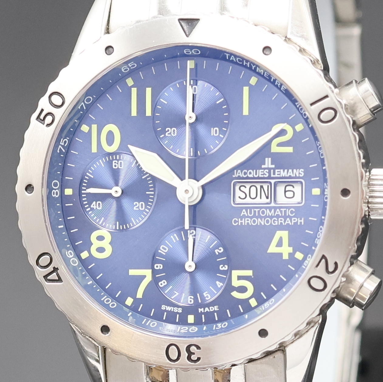 Detail a: JACQUES LEMANS Flieger-Armbandchronograph Referenz 1-789-T, Schweiz um 1995, Automatik, Edelstahlgeh. inkl. orig. Gliederband m. Faltschl., Boden u. ...