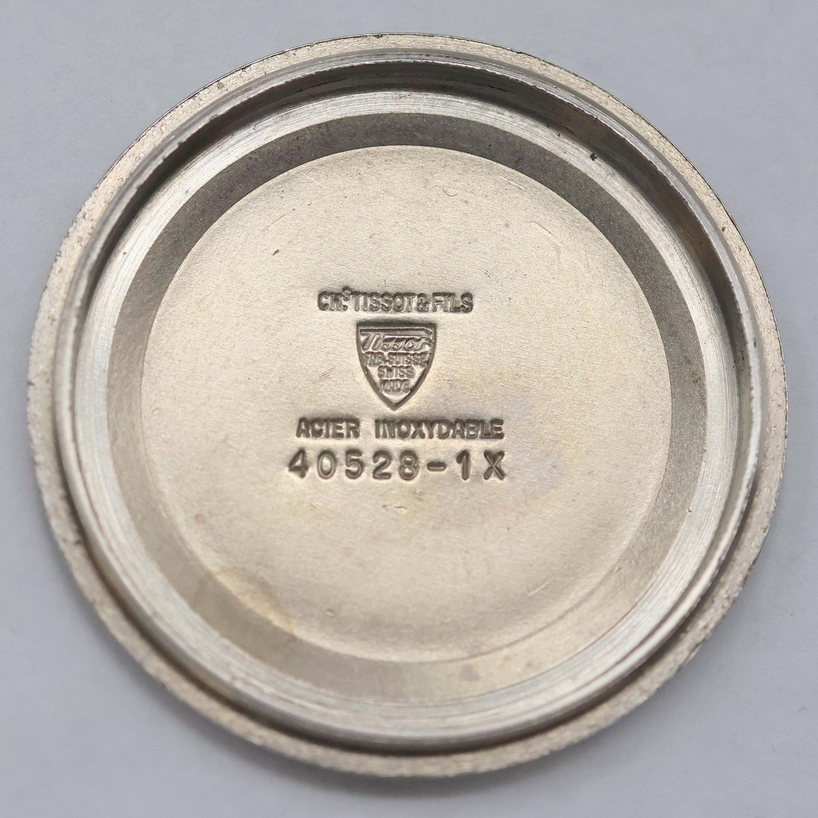 Detail g: TISSOT Armbandchronograph PR 516 Referenz 40528-1X, Schweiz um 1970, Handaufzug, Edelstahlgeh., Boden verschr., Tachymeter- Lünette, schwarzes ...