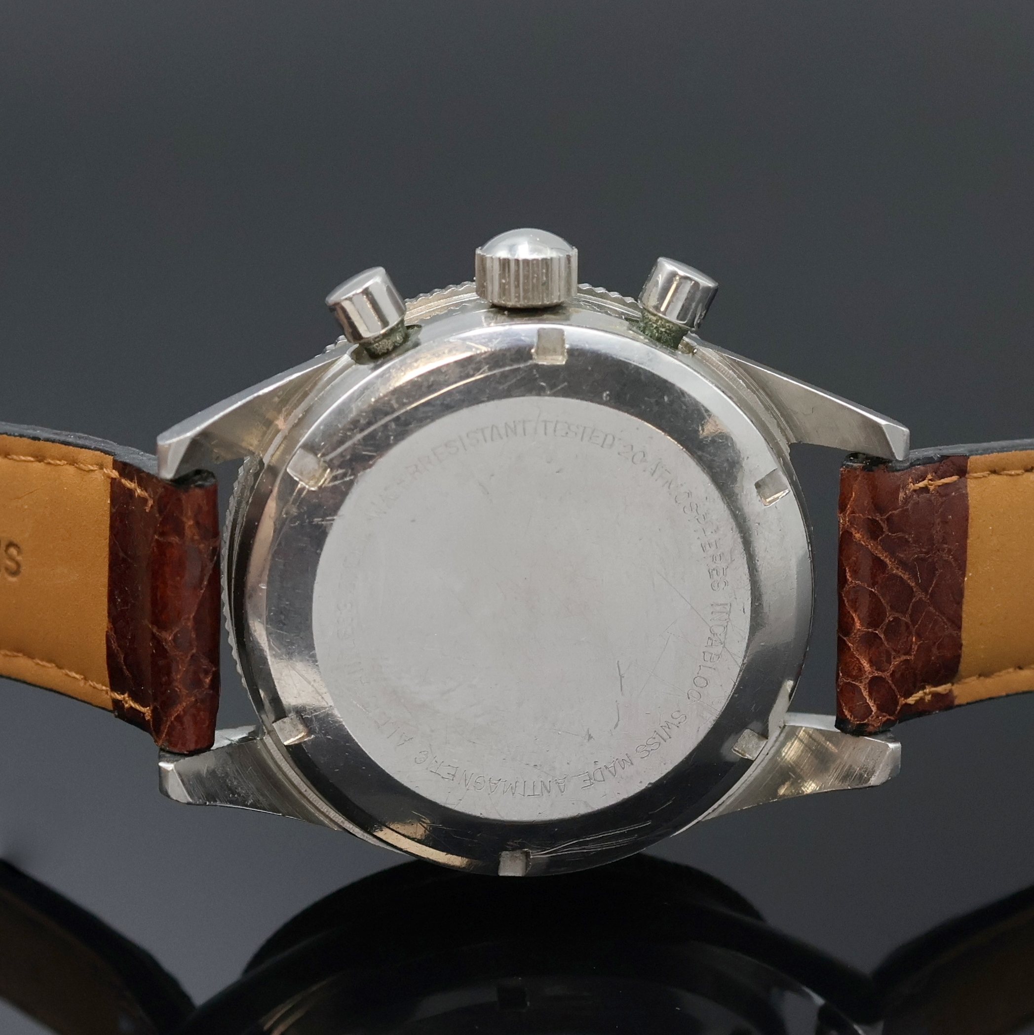 Detail c: LE JOUR Armbandchronograph in Stahl, Schweiz um 1970, Handaufzug, Boden verschr., Lünette m. 60er Teilung beids. drehb., schwarzes Zifferbl. m. ...