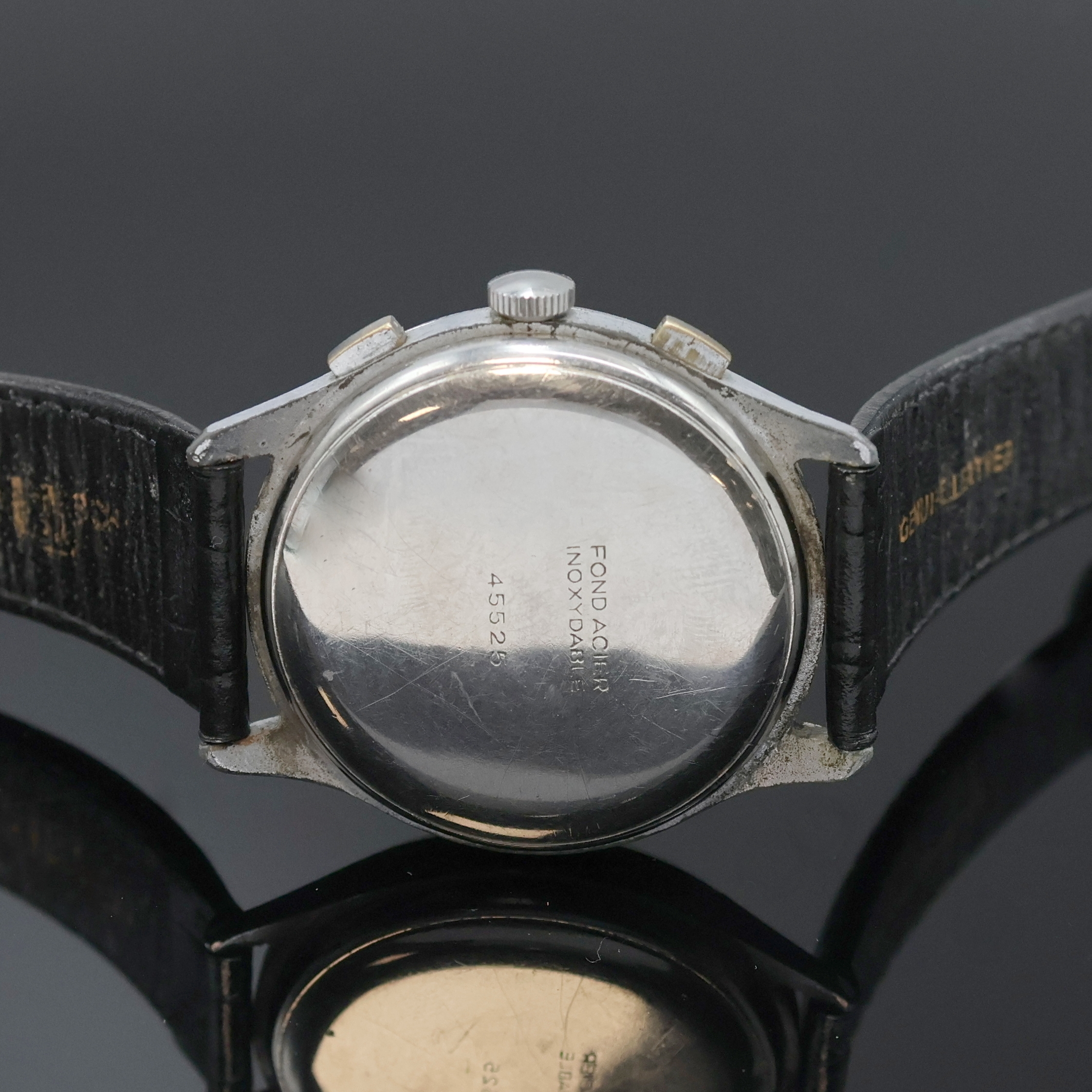 Detail c: Schaltradchronograph bezeichnet Ogival Kaliber Valjoux 22, Schweiz um 1940, Handaufzug, verchr. Geh., Boden gedr., silb. Zifferbl. rest., arab. ...