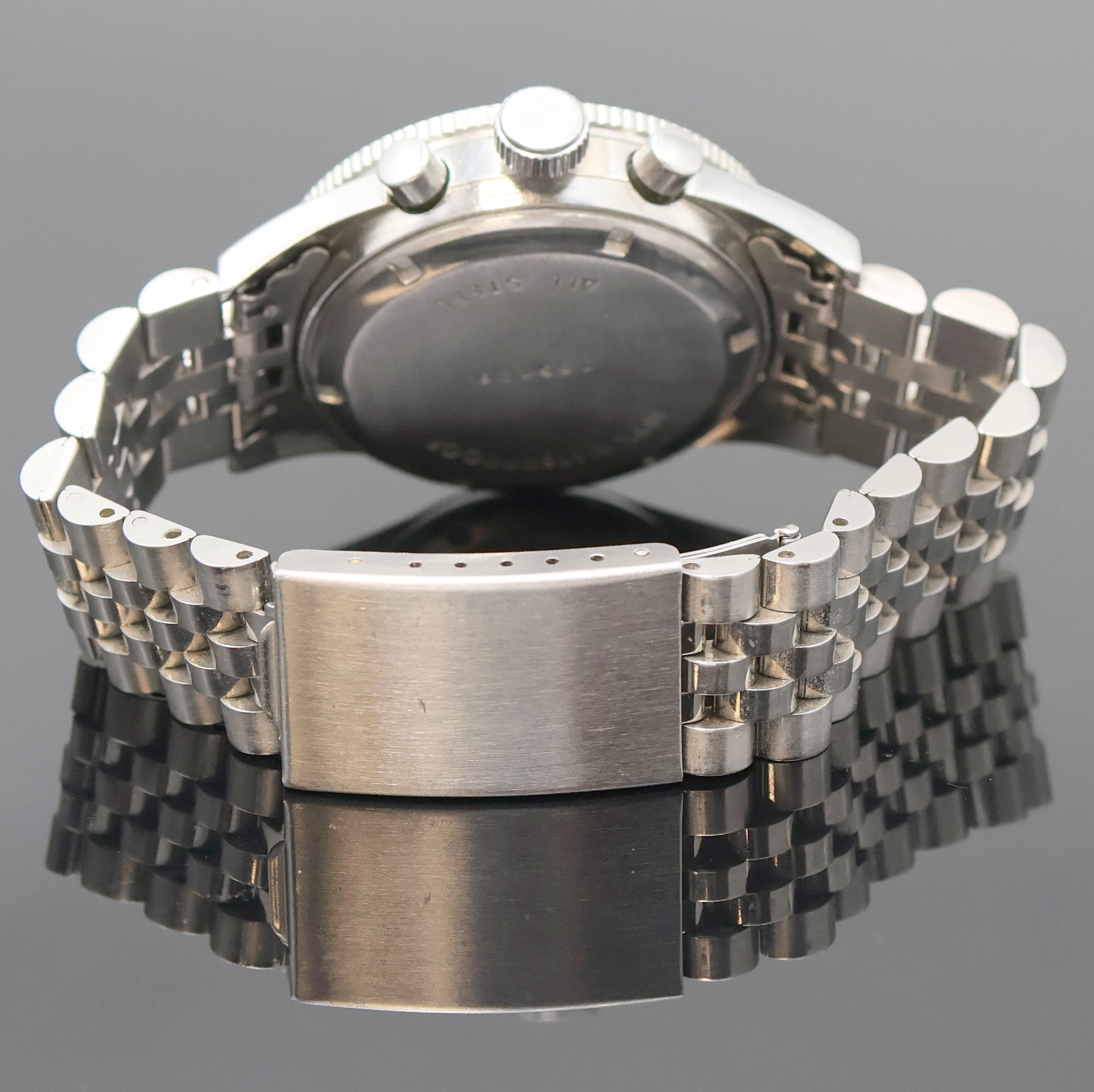 Detail c: YEMA Armbandchronograph in Stahl, Schweiz um 1970, Handaufzug, Boden verschr., neutr. Gliederband m. Faltschl., Lünette m. 60er Teil. beids. drehb., ...
