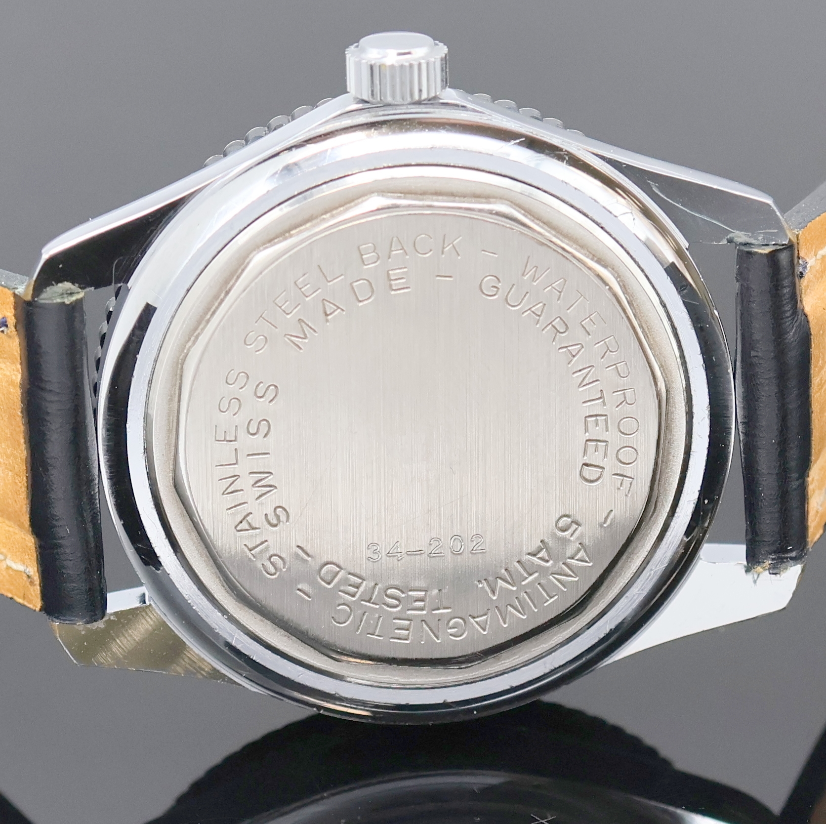 Detail d: MARC NICOLET verchromte Armbanduhr, Schweiz um 1970, Automatik, Stahlboden verschr., Lünette m. 60er teil. beids. drehb., dunkelblaues Zifferbl. m. ...