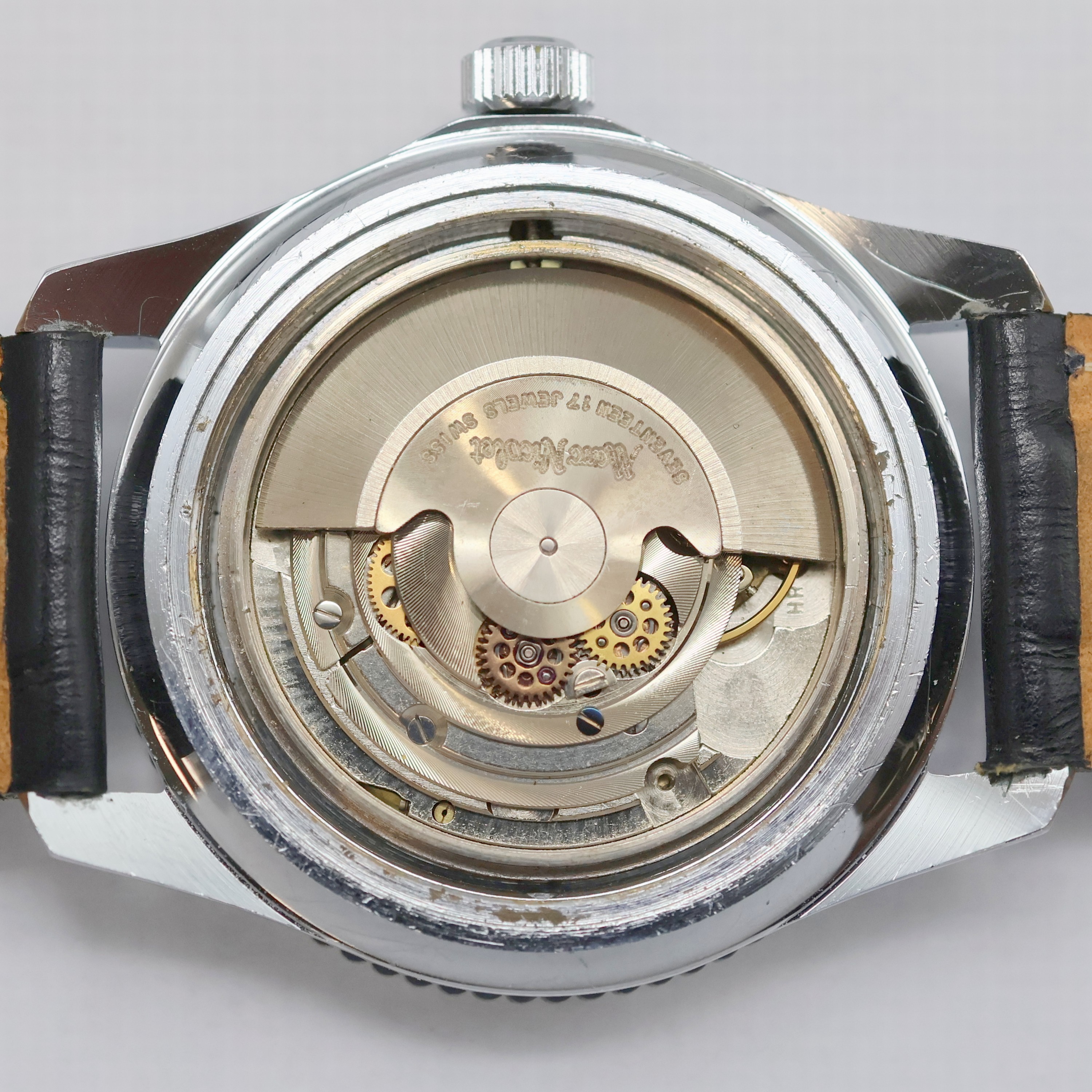 Detail f: MARC NICOLET verchromte Armbanduhr, Schweiz um 1970, Automatik, Stahlboden verschr., Lünette m. 60er teil. beids. drehb., dunkelblaues Zifferbl. m. ...