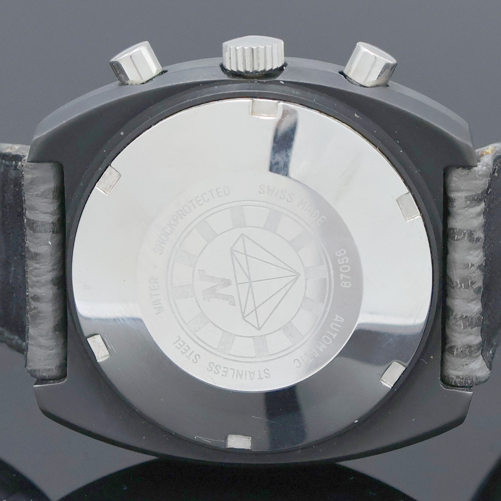 Detail d: Armbandchronograph bezeichnet Kentucky, Schweiz um 1975, Automatik, Edelstahlgeh. teils geschw., Boden verschr., silb. Zifferbl. m. aufges. ...