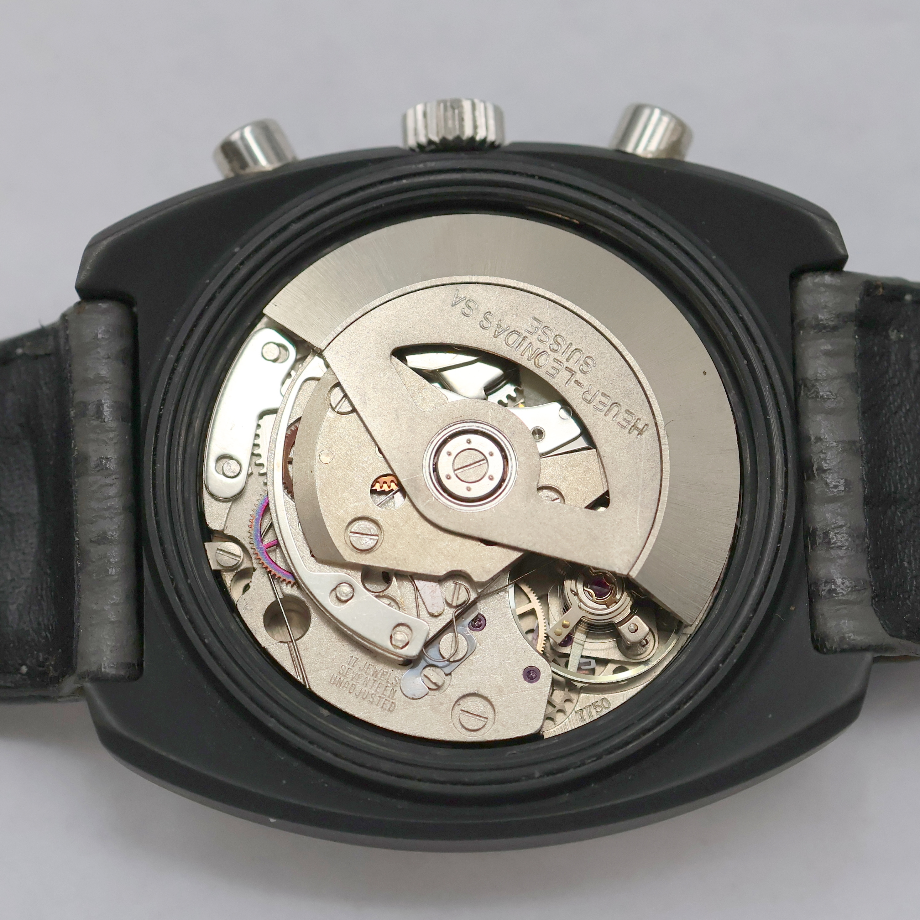 Detail e: Armbandchronograph bezeichnet Kentucky, Schweiz um 1975, Automatik, Edelstahlgeh. teils geschw., Boden verschr., silb. Zifferbl. m. aufges. ...