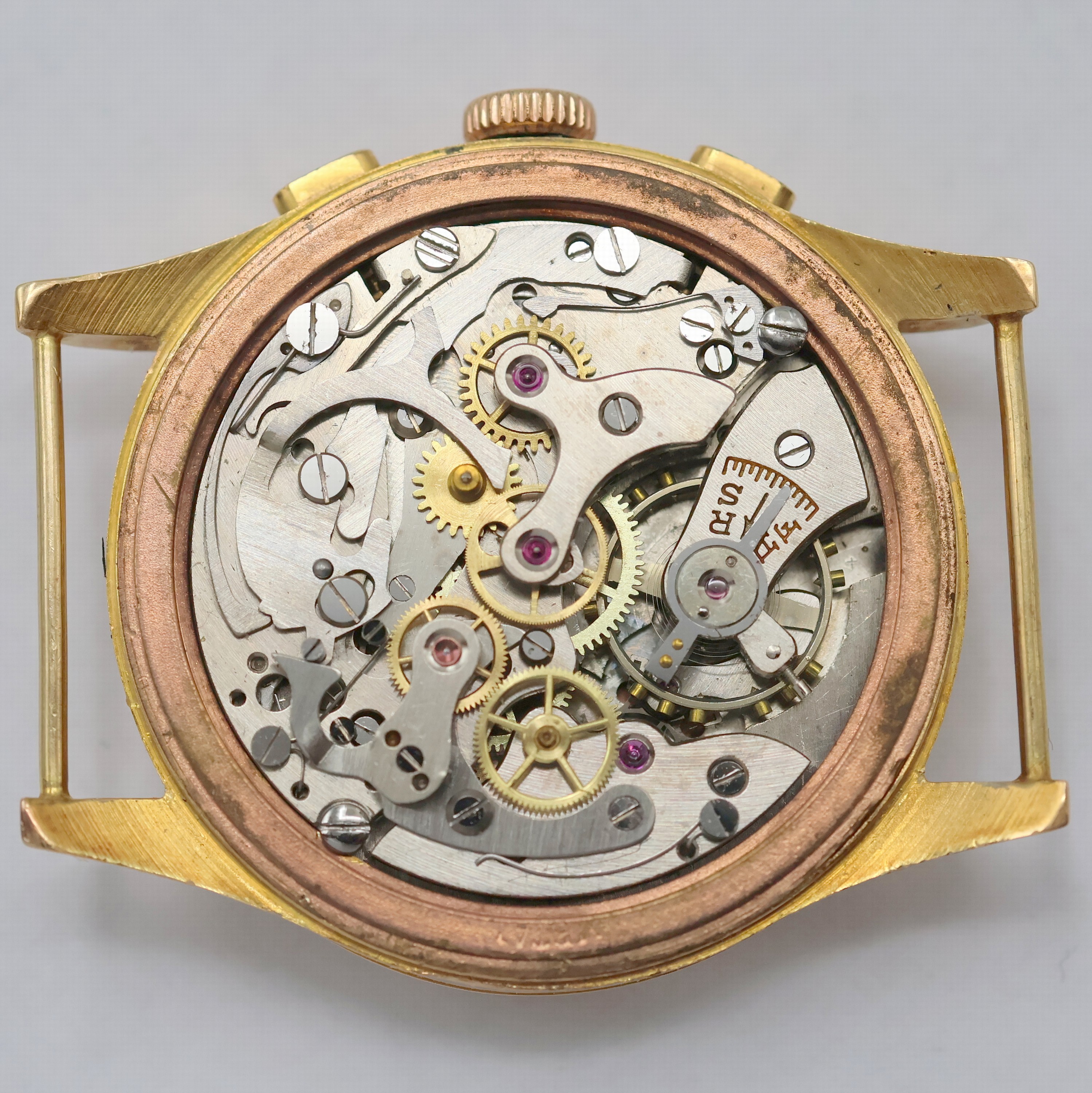Detail f: CHRONOGRAPHE SUISSE Armbandchronograph in RoseG 750/000, Schweiz um 1950, Handaufzug, Boden aufgedr., Metallcuvette, champagnerfarb. Zifferbl. m. ...