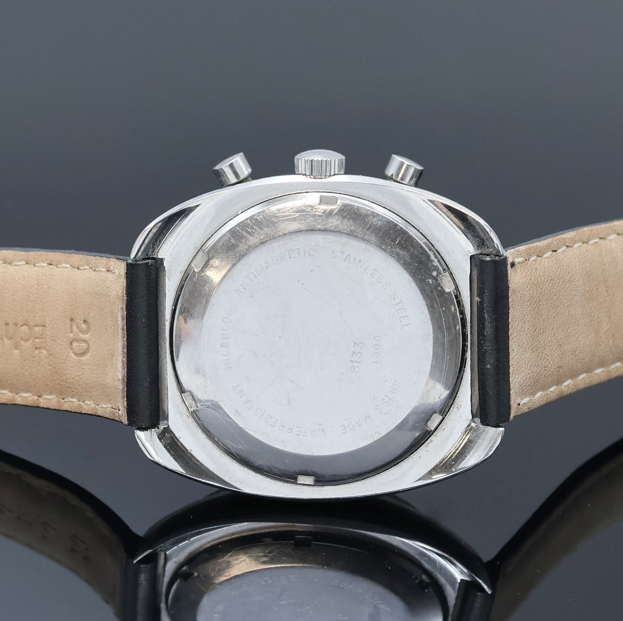 Detail c: AERO Neuchatel Armbandchronograph in Stahl, Schweiz um 1975, Handaufzug, Boden verschr., schwarzes Zifferbl. m. arab. Leuchtzahlen, weiße ...