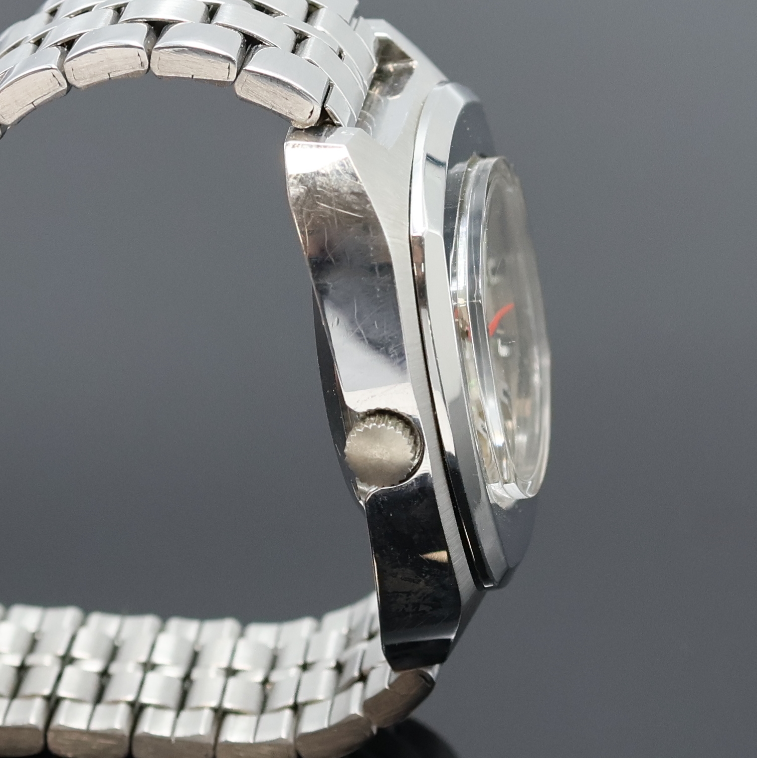 Detail b: ARSA-MATIC Precision Herrenarmbanduhr in Stahl, Schweiz um 1970, Automatik, Boden verschr., neutr. Stahlband m. Faltschl., silb. Zifferbl. m. aufges. ...
