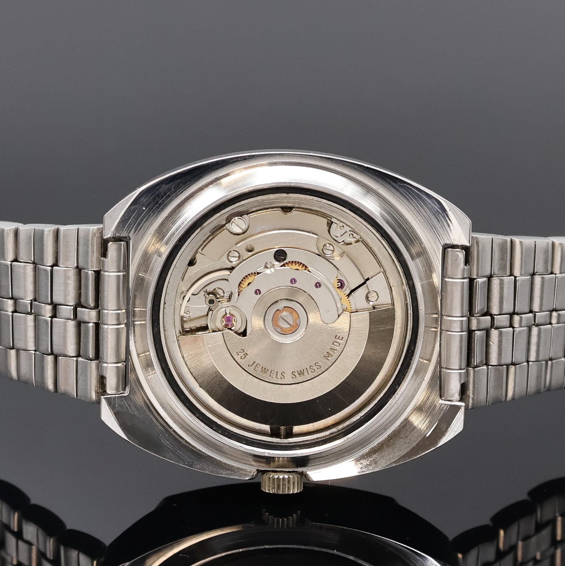 Detail e: ARSA-MATIC Precision Herrenarmbanduhr in Stahl, Schweiz um 1970, Automatik, Boden verschr., neutr. Stahlband m. Faltschl., silb. Zifferbl. m. aufges. ...