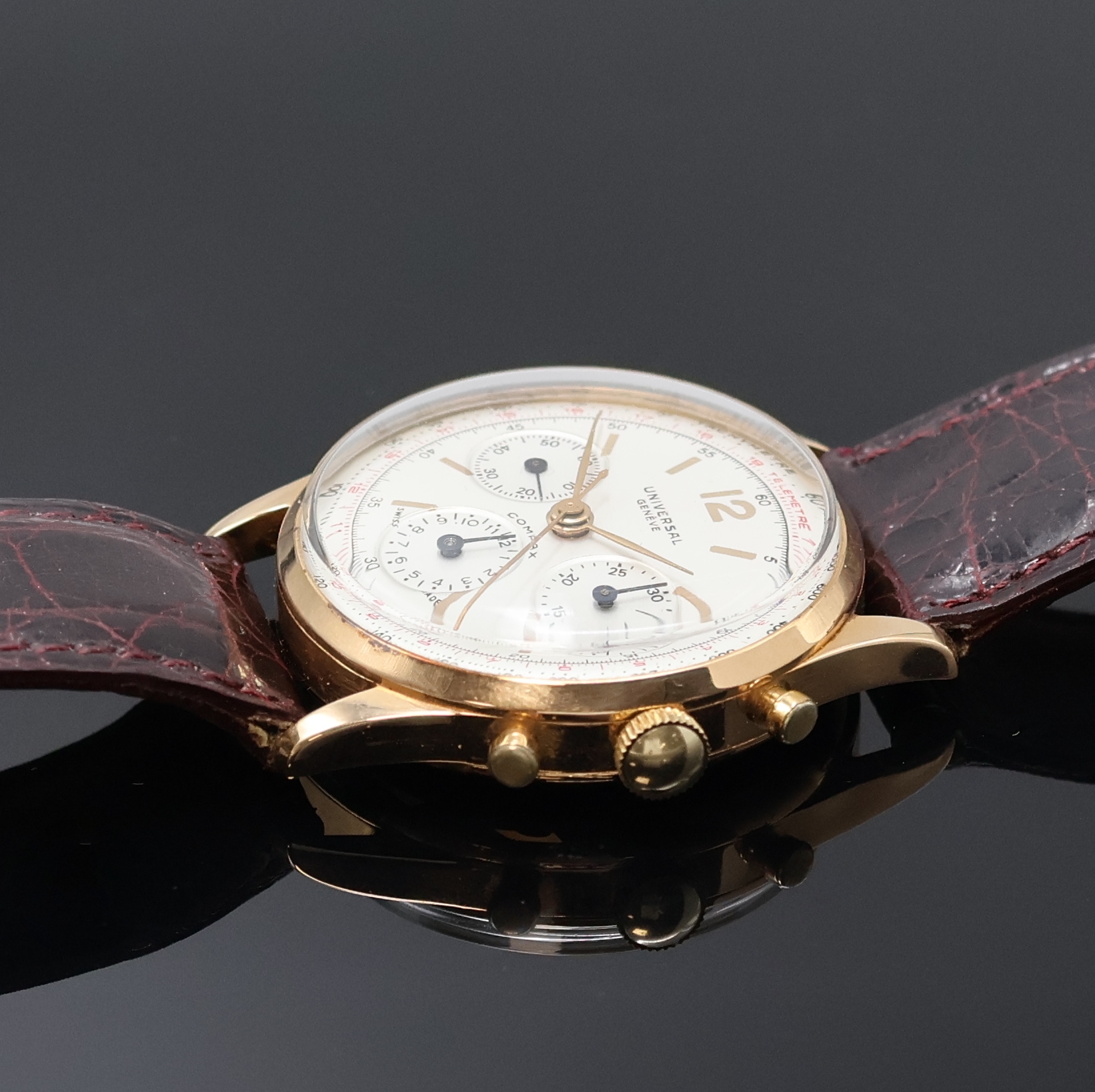 Detail b: UNIVERSAL GENEVE Compax Armbandchronograph in RoseG 750/000, Schweiz um 1950, Handaufzug, Boden aufgedr., silb. Zifferbl. rest., gold. Std.-Ind., ...