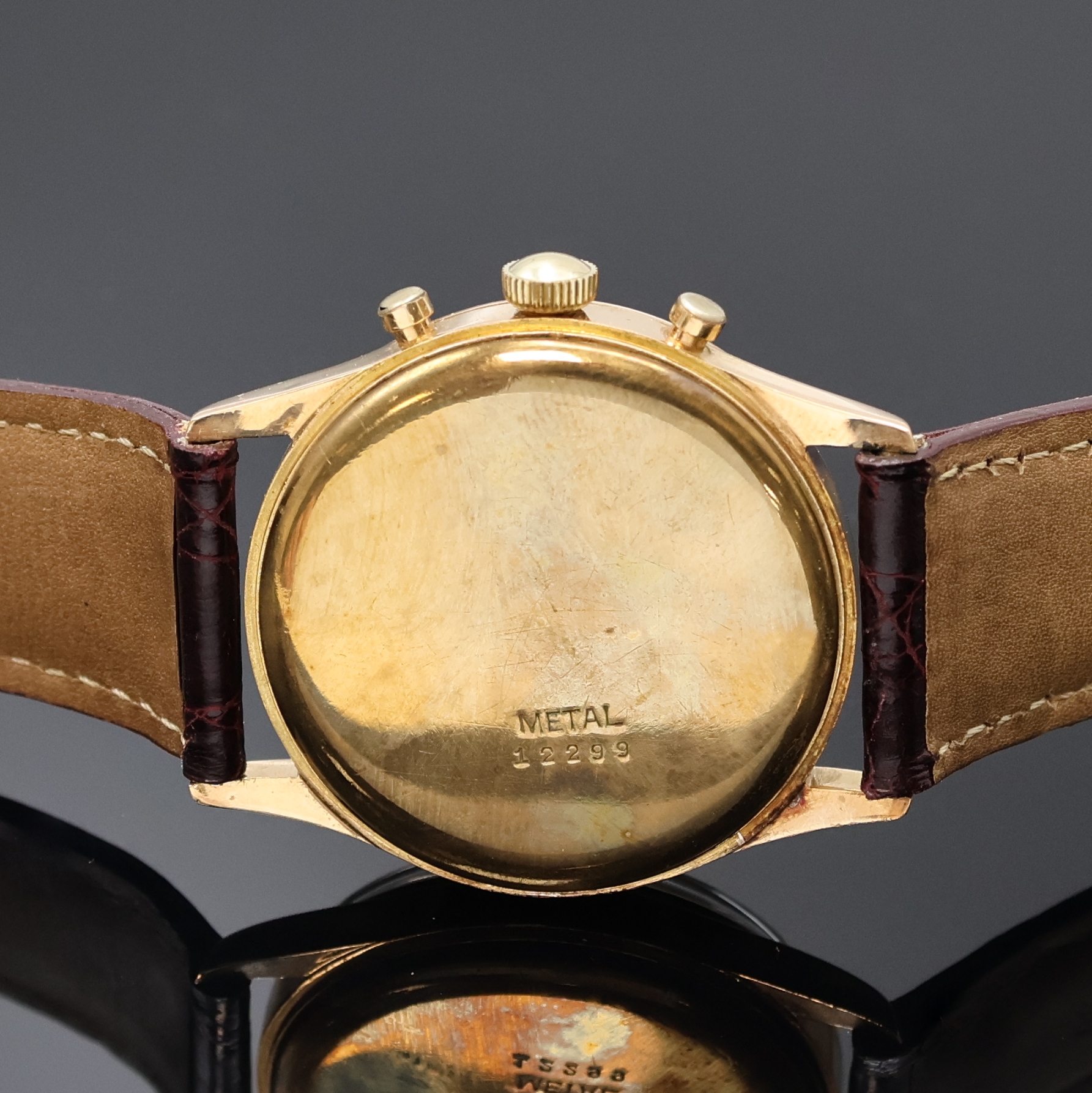 Detail e: UNIVERSAL GENEVE Compax Armbandchronograph in RoseG 750/000, Schweiz um 1950, Handaufzug, Boden aufgedr., silb. Zifferbl. rest., gold. Std.-Ind., ...