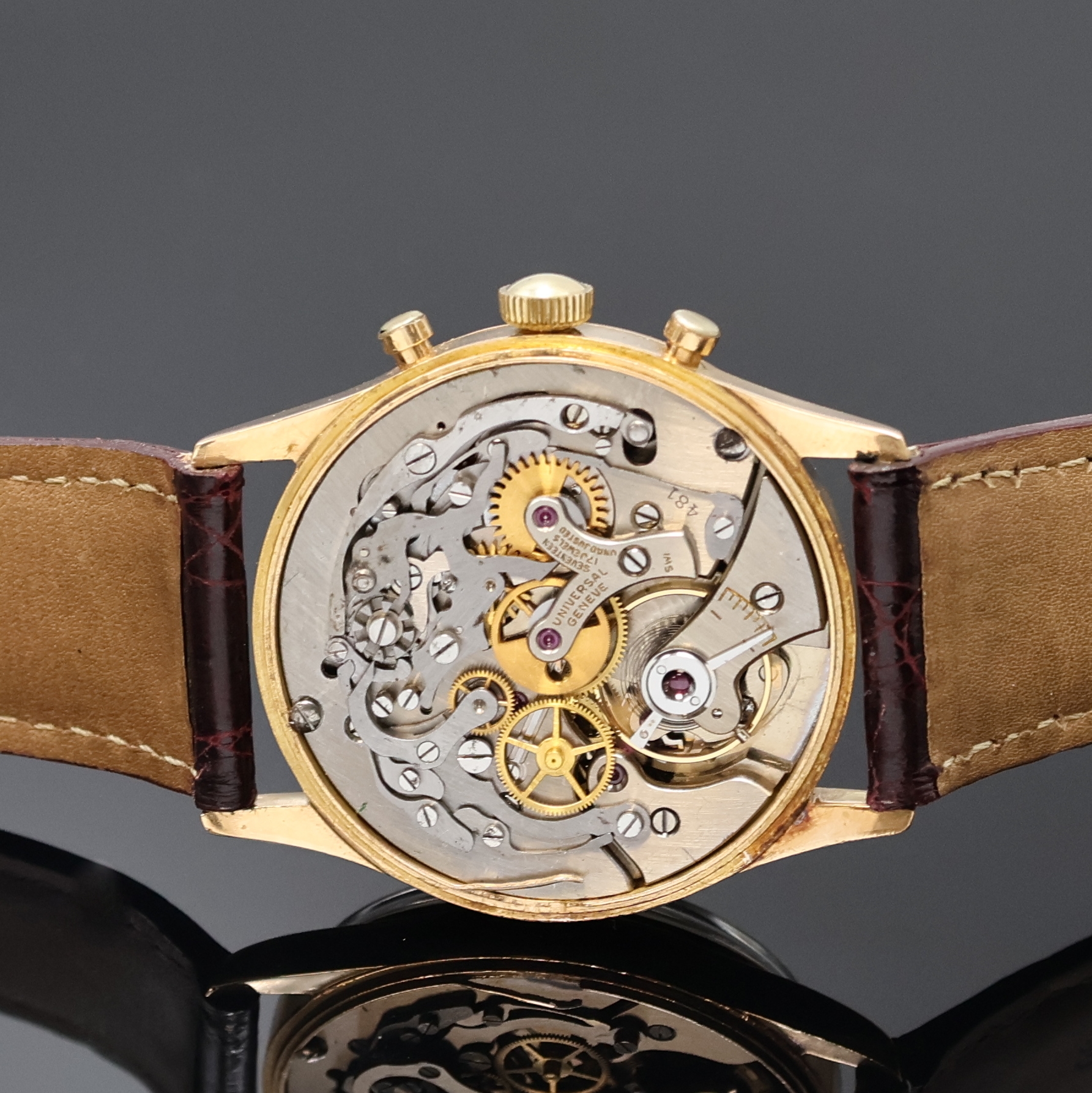 Detail f: UNIVERSAL GENEVE Compax Armbandchronograph in RoseG 750/000, Schweiz um 1950, Handaufzug, Boden aufgedr., silb. Zifferbl. rest., gold. Std.-Ind., ...