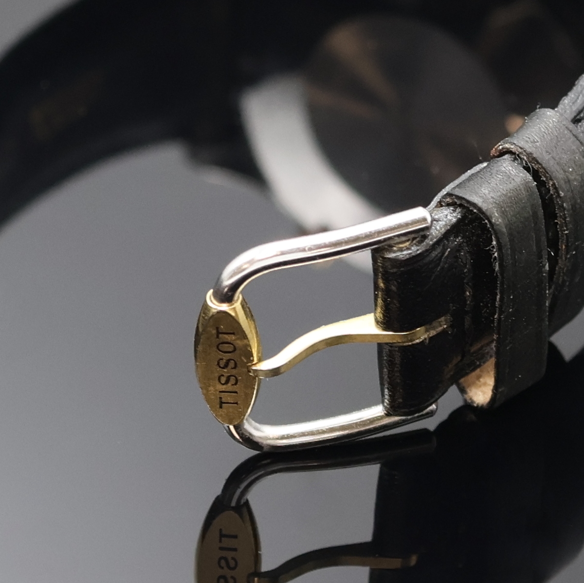 Detail b: TISSOT PRX Armbandchronograph, Schweiz um 1990, Automatik, Stahlgeh. m. verg. 12-eckiger Lünette, Boden verschr., schwarz. Waffel- Zifferbl., gold. ...
