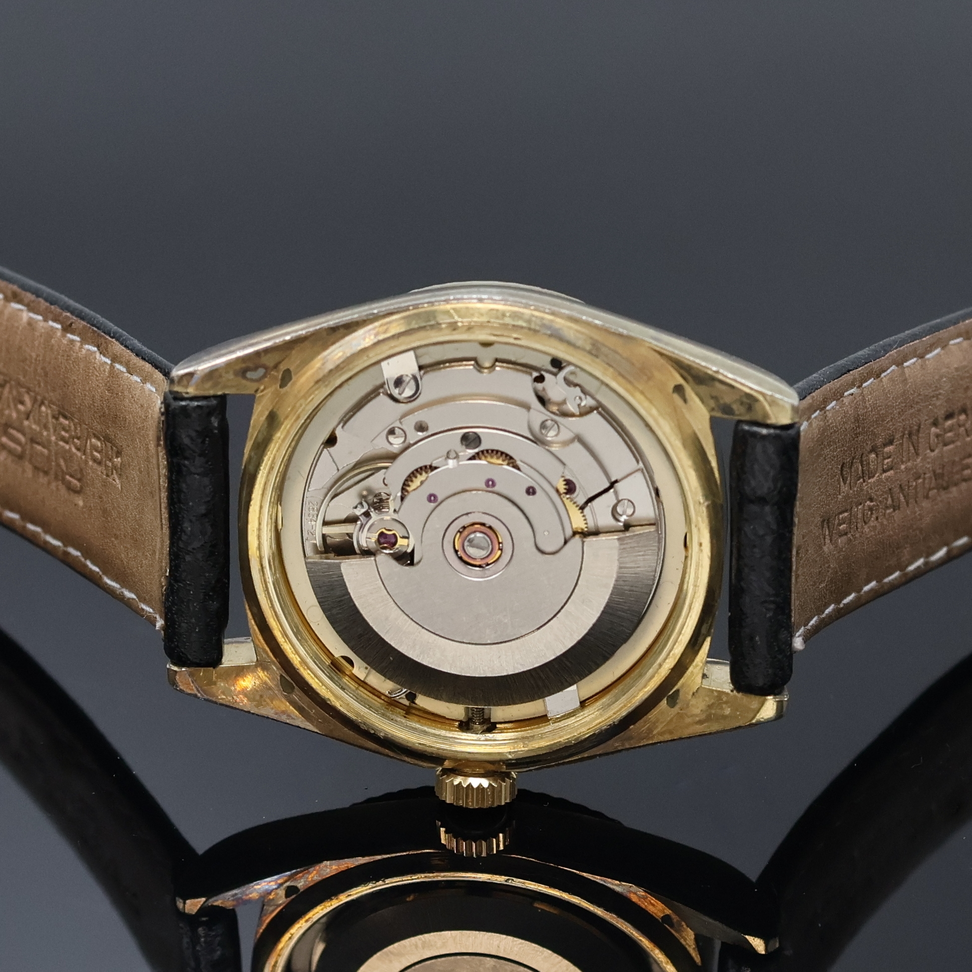 Detail e: BULOVA Super Seville Day & Date Armbanduhr, Schweiz um 1990, Automatik, verg. Geh., Stahlboden u. Krone verschr., schwarzes Zifferbl. m. aufges. ...